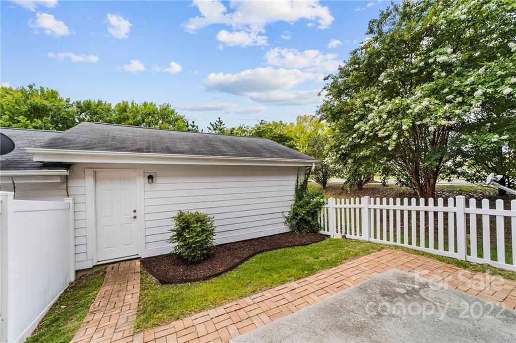 10559 Rocky Ford Club Road Charlotte, NC 28078 - Photo 16 of 18 a view of a yard and garage