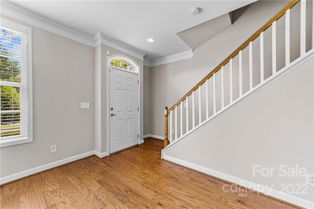 10559 Rocky Ford Club Road Charlotte, NC 28078 - Photo 9 of 18 a view of an entryway with wooden floor