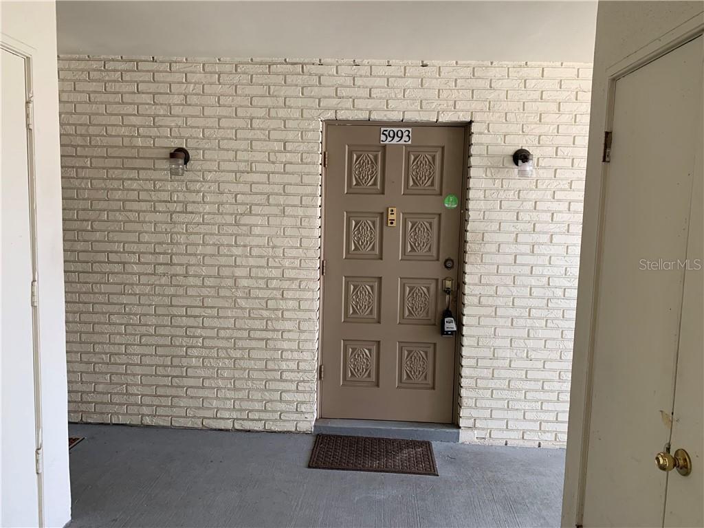 5993 Village Circle North, Unit GE Orlando, FL 32822 - Photo 11 of 16 a view of entryway with elevator