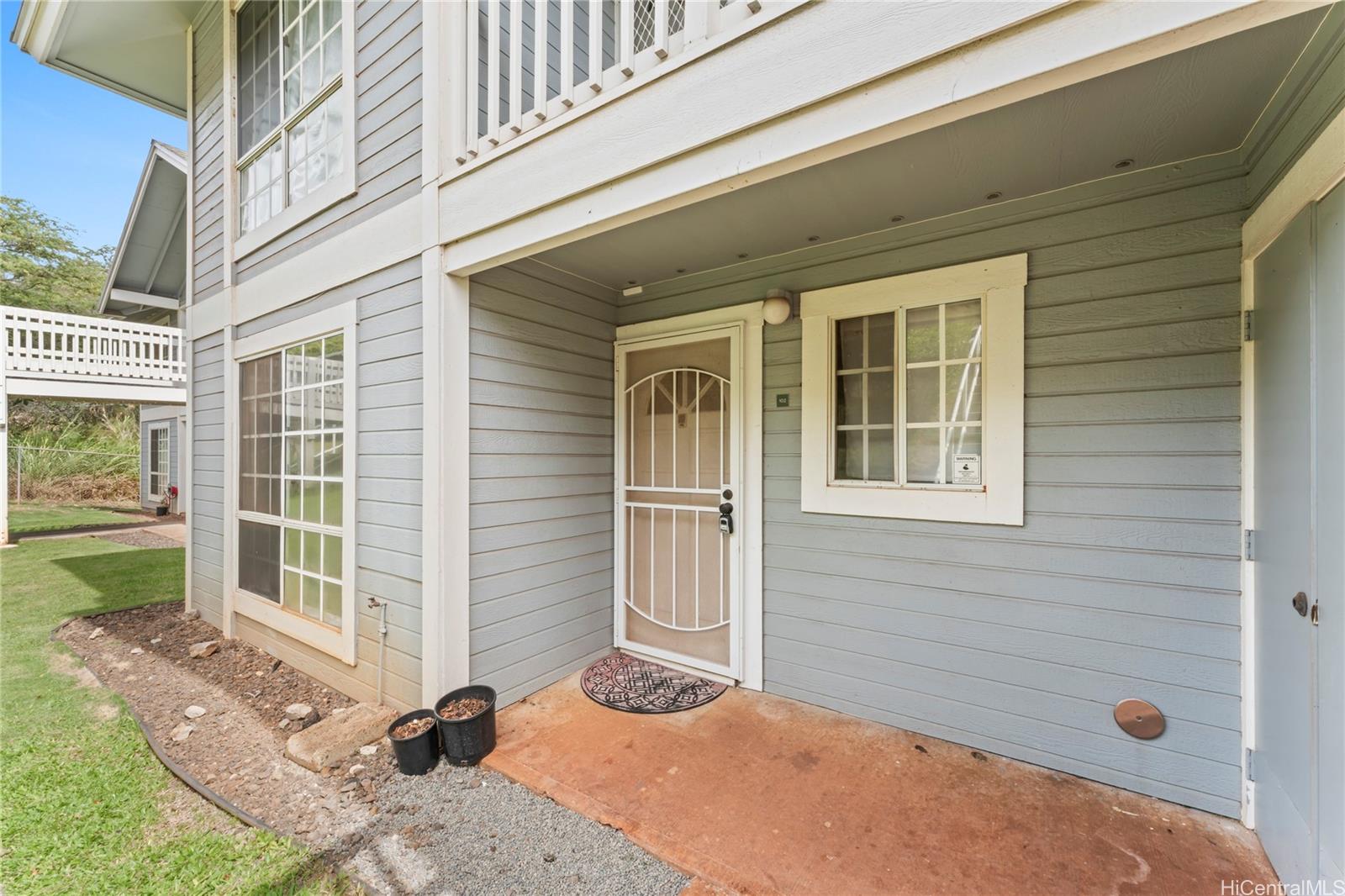 92-1136 Hame Street, Unit 10102 Kapolei, HI 96707 - Photo 22 of 22 a front view of a house