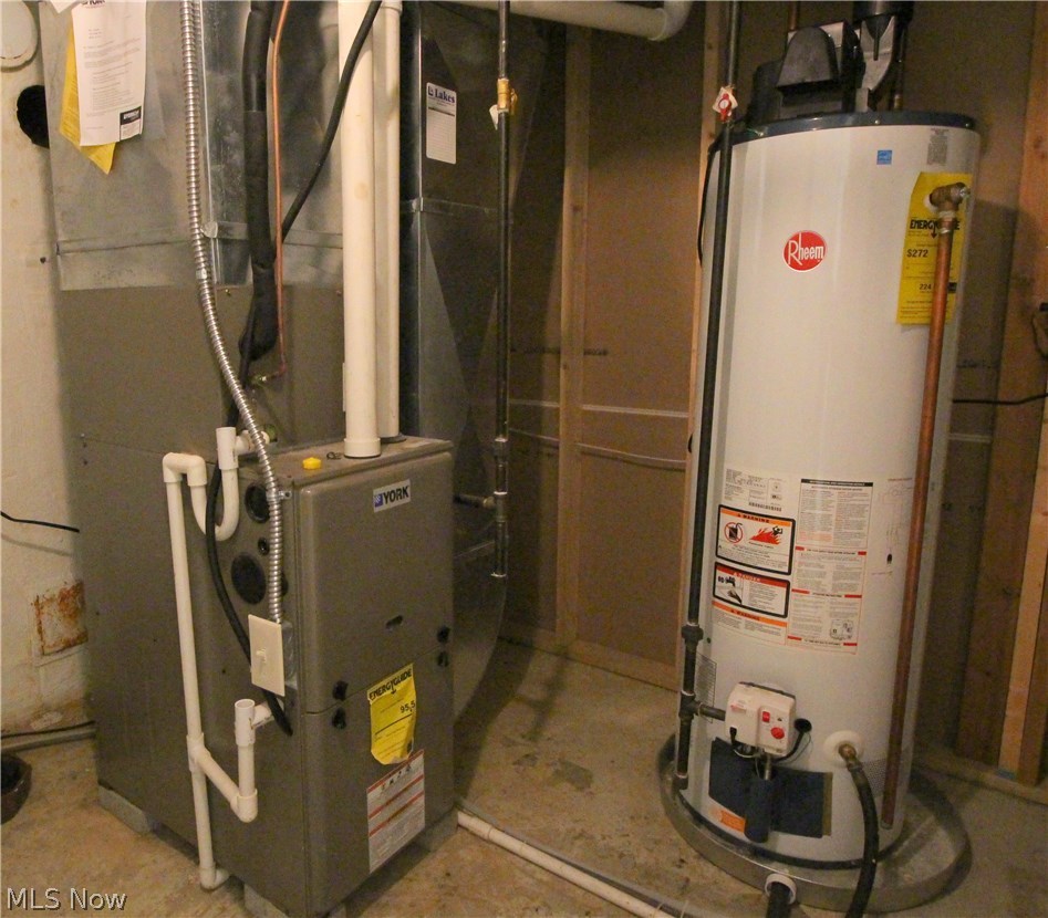 1930 Knight Road Akron, OH 44306 - Photo 20 of 25 Furnace and Hot Water Tank - York 90+ efficient furnace and newer hot water tank!