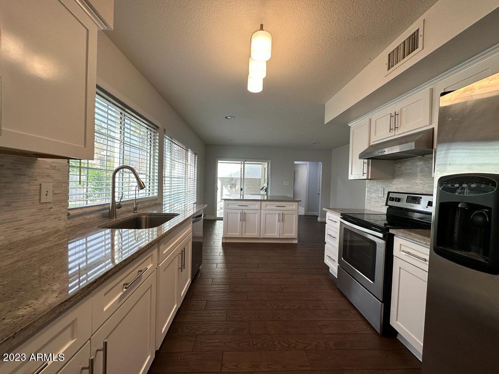 4254 East Vineyard Road Phoenix, AZ 85042 - Photo 9 of 63 IMG-20230820-WA0096