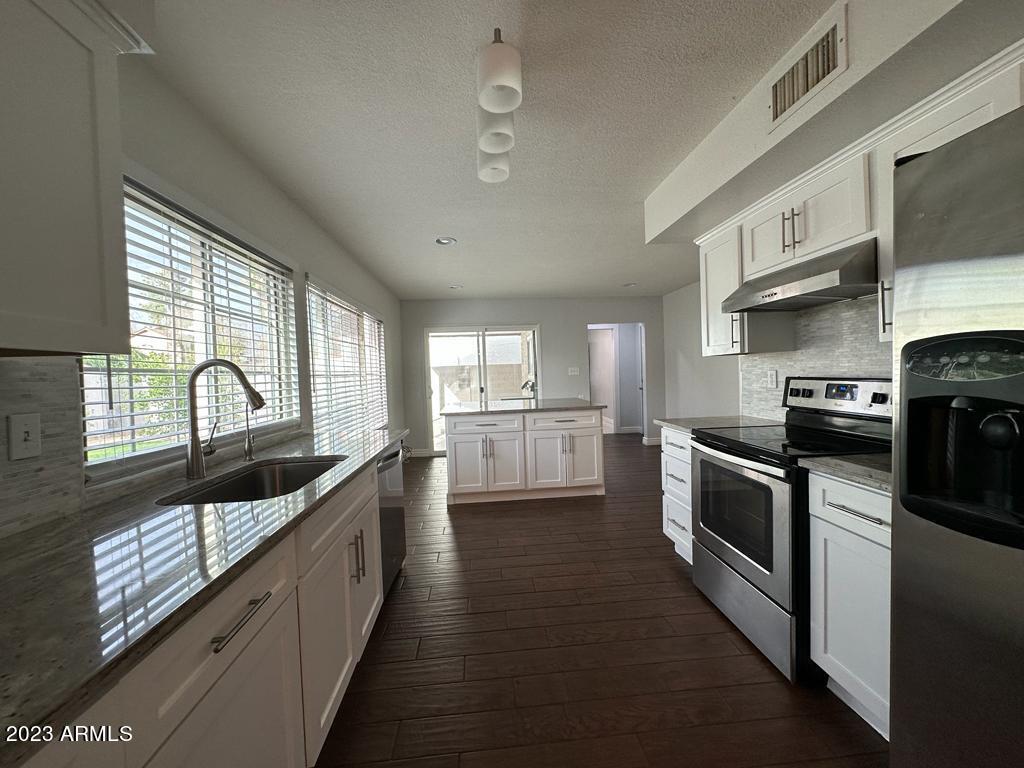 4254 East Vineyard Road Phoenix, AZ 85042 - Photo 10 of 63 IMG-20230820-WA0088