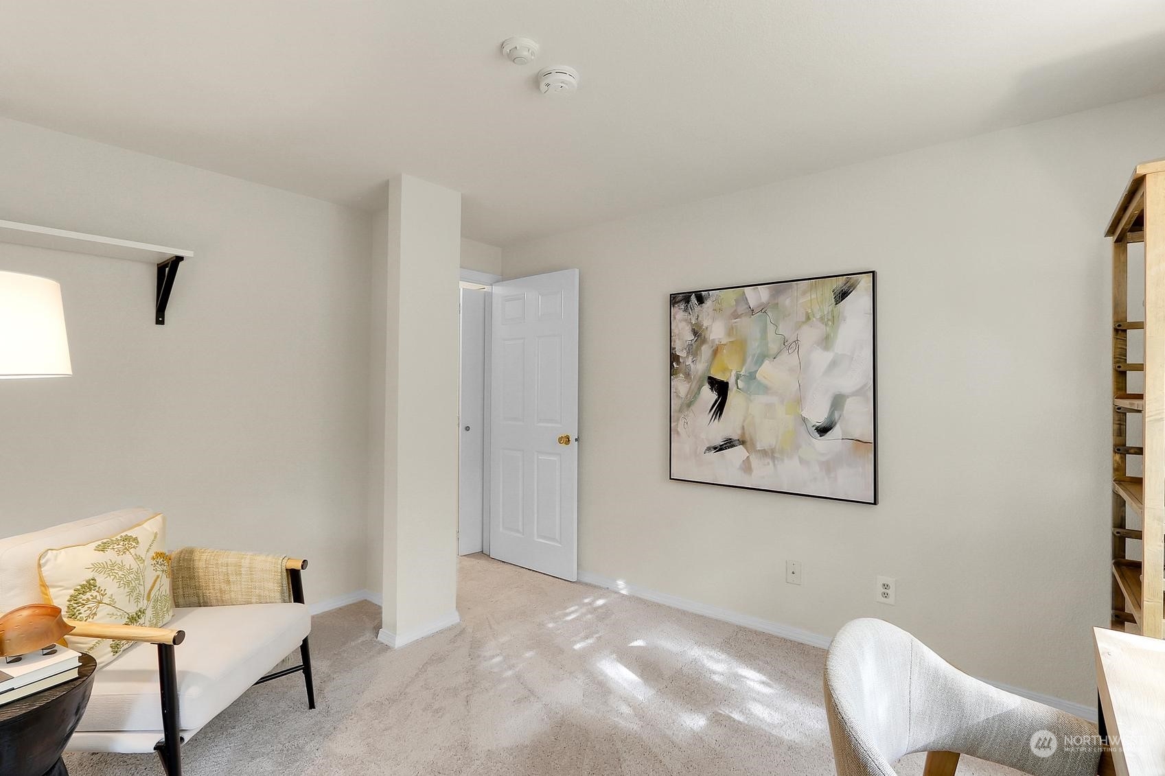 10822 East Riverside Drive, Unit A203 Bothell, WA 98011 - Photo 16 of 20 a view of a livingroom with a couch