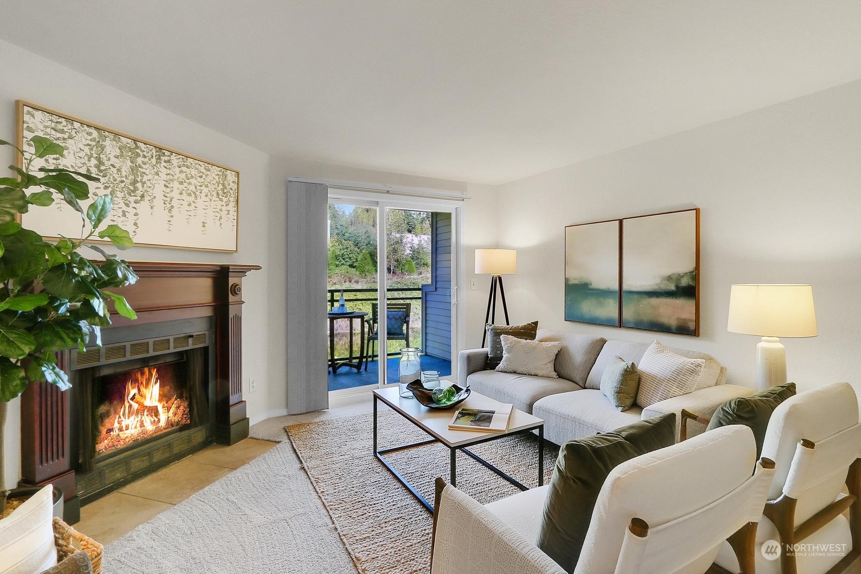 10822 East Riverside Drive, Unit A203 Bothell, WA 98011 - Photo 3 of 20 a living room with furniture and a fireplace