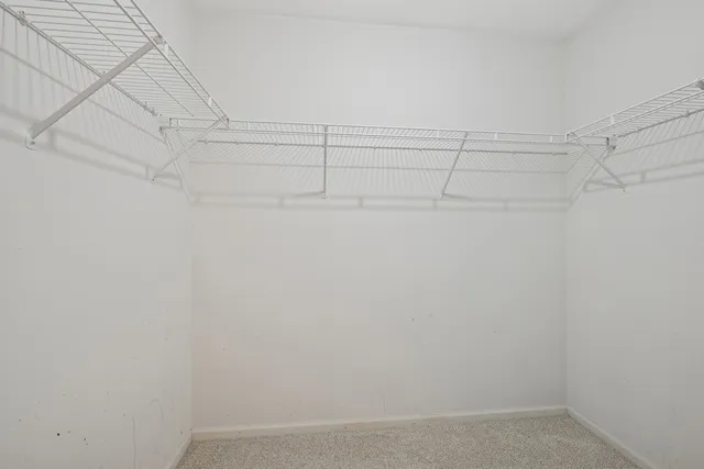 a view of a room with racks on the wall