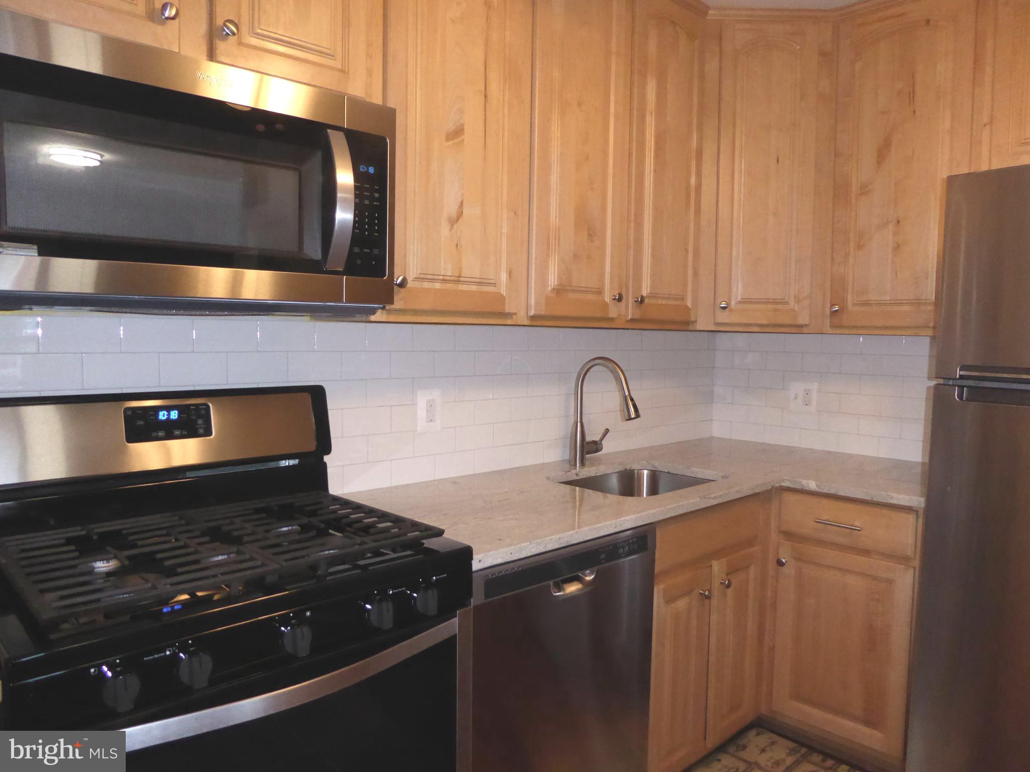 5572 Kendrick Lane Burke, VA 22015 - Photo 23 of 57 Upgraded cabinets and appliances
