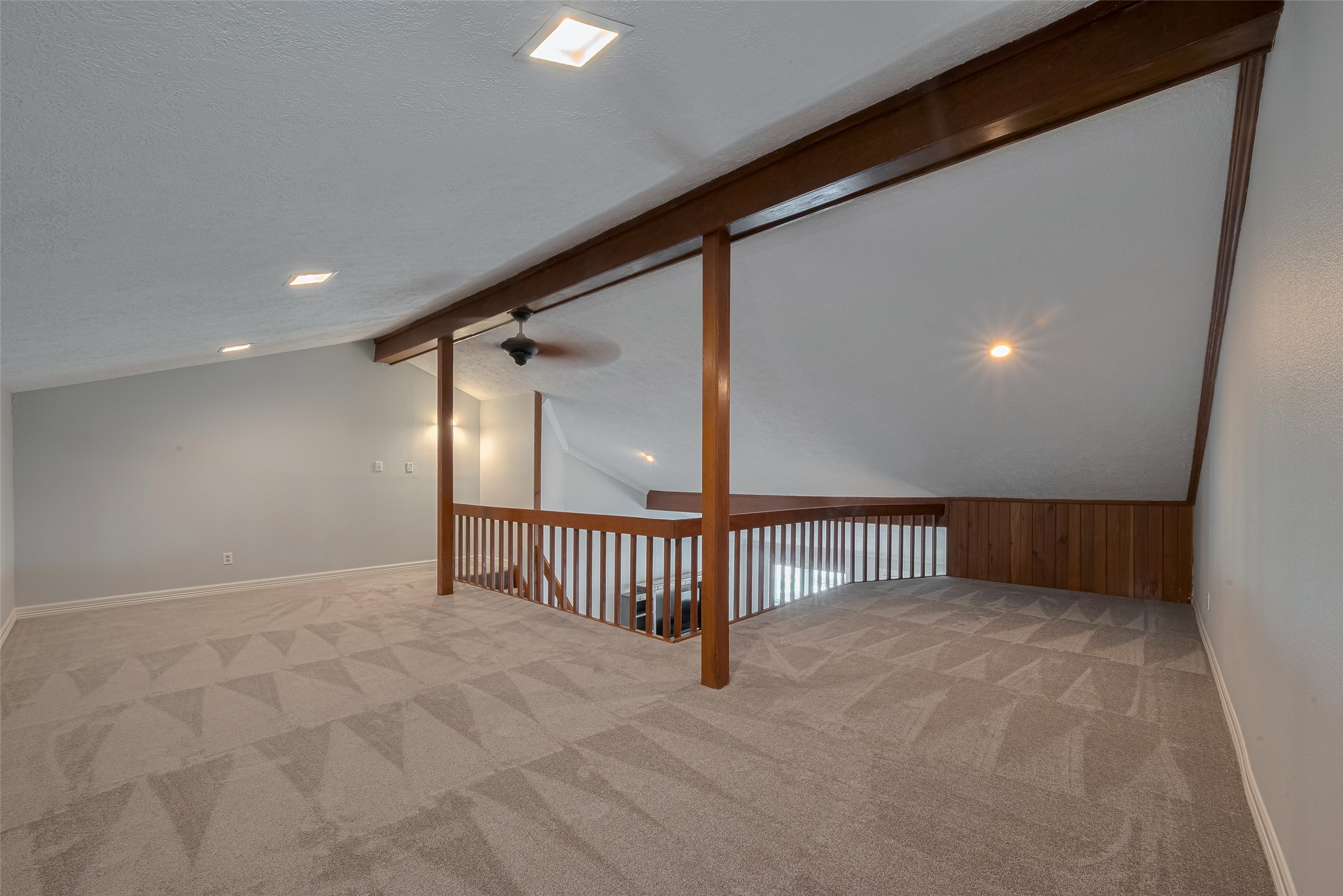 64 Hideaway Drive Friendswood, TX 77546 - Photo 20 of 33 a view of livingroom with stairs