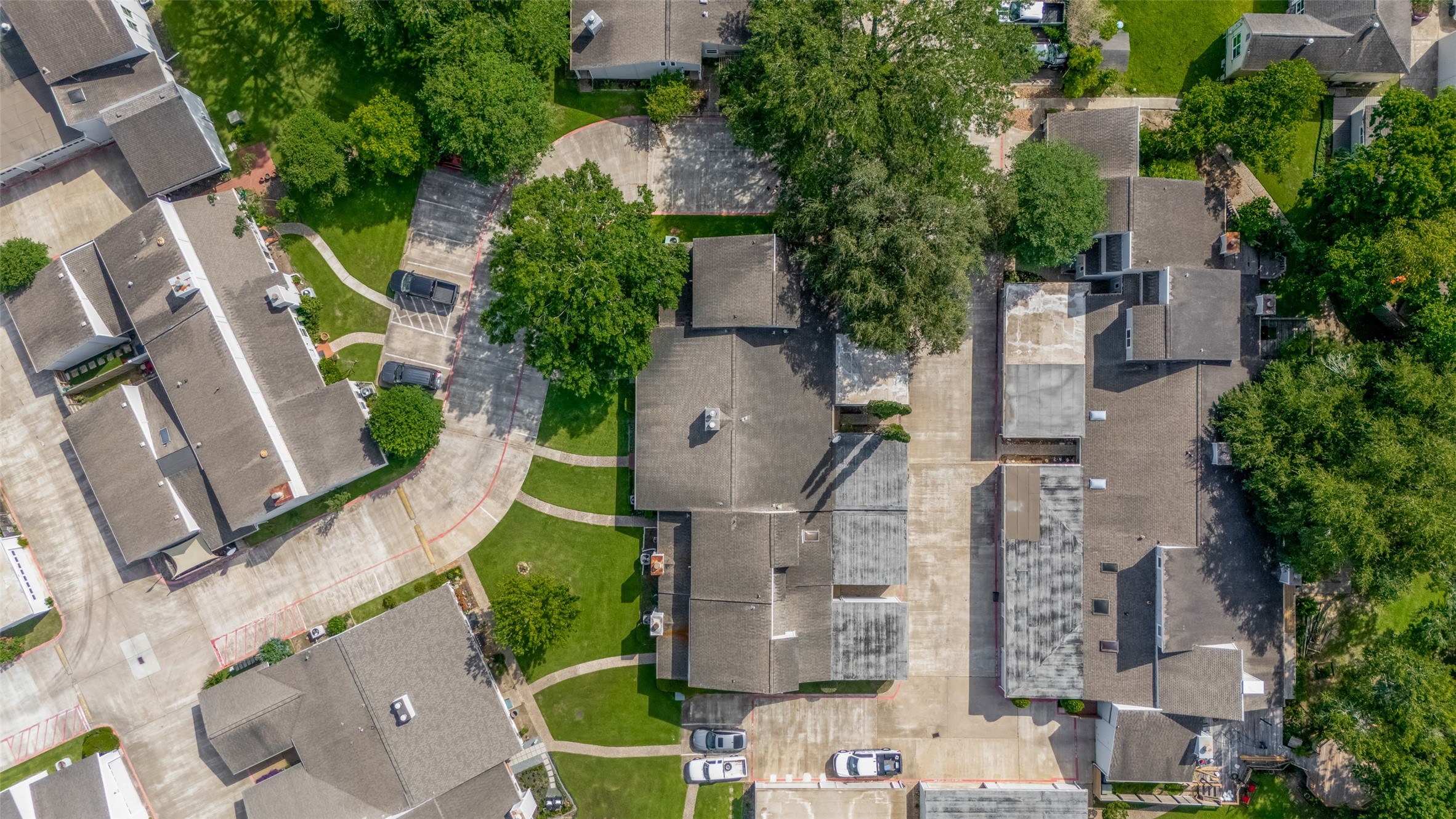 64 Hideaway Drive Friendswood, TX 77546 - Photo 32 of 33 an aerial view of residential houses with outdoor space