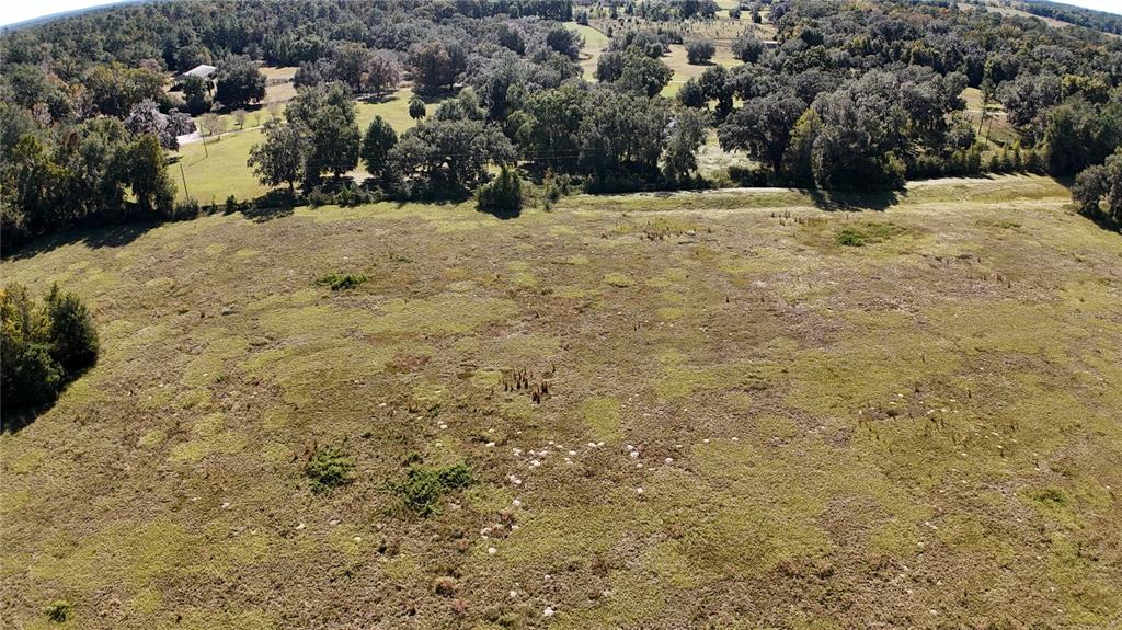 Northwest 54th Loop Ocala, FL 34482 - Photo 2 of 15 a view of outdoor space yard and basketball court