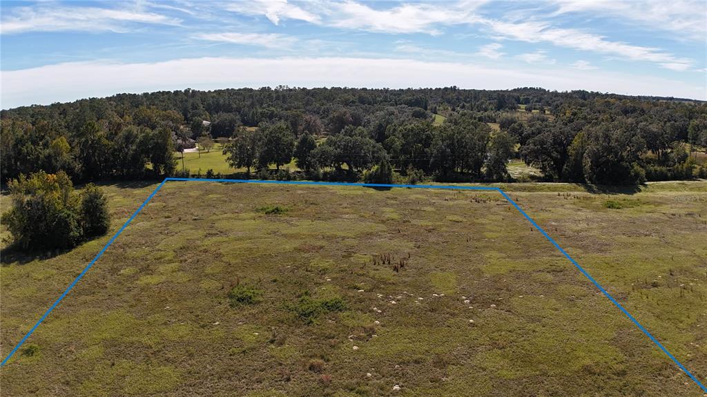Northwest 54th Loop Ocala, FL 34482 - Photo 8 of 15 a view of outdoor space with mountain view