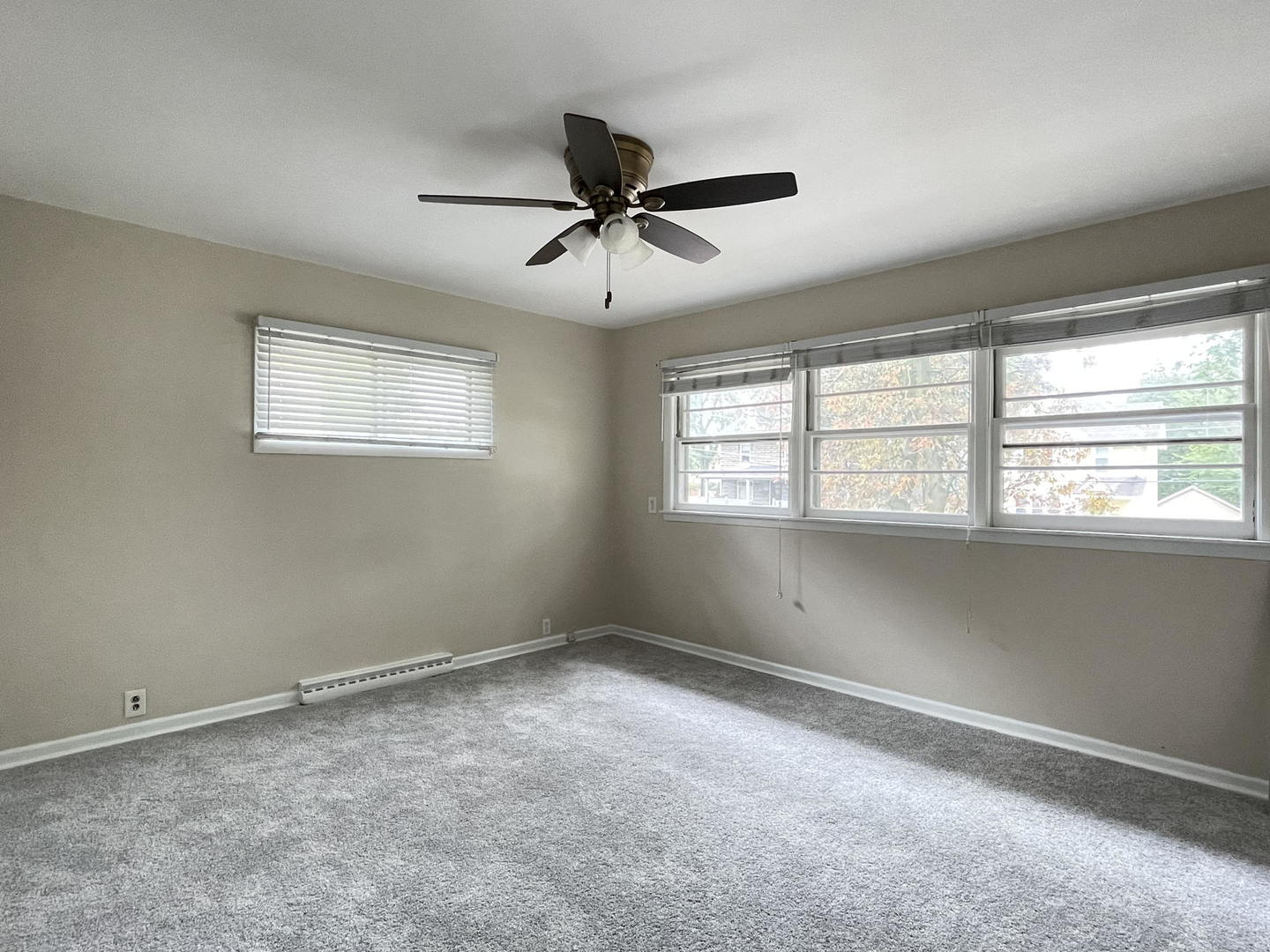 409 South Naperville Road Wheaton, IL 60187 - Photo 9 of 11 a view of an empty room with a window