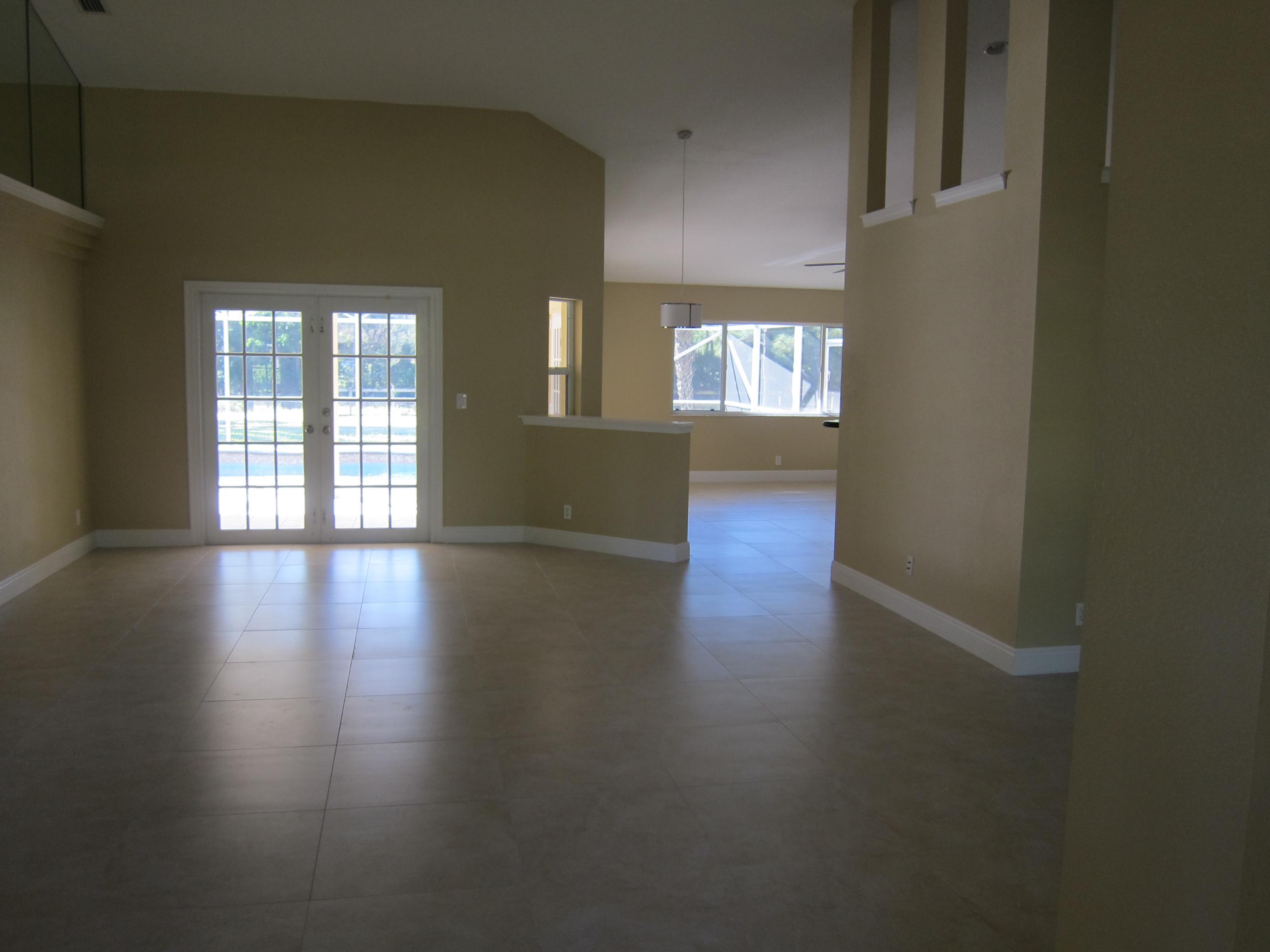 16228 63rd Road North Loxahatchee, FL 33470 - Photo 12 of 33 Living room right off kitchen
