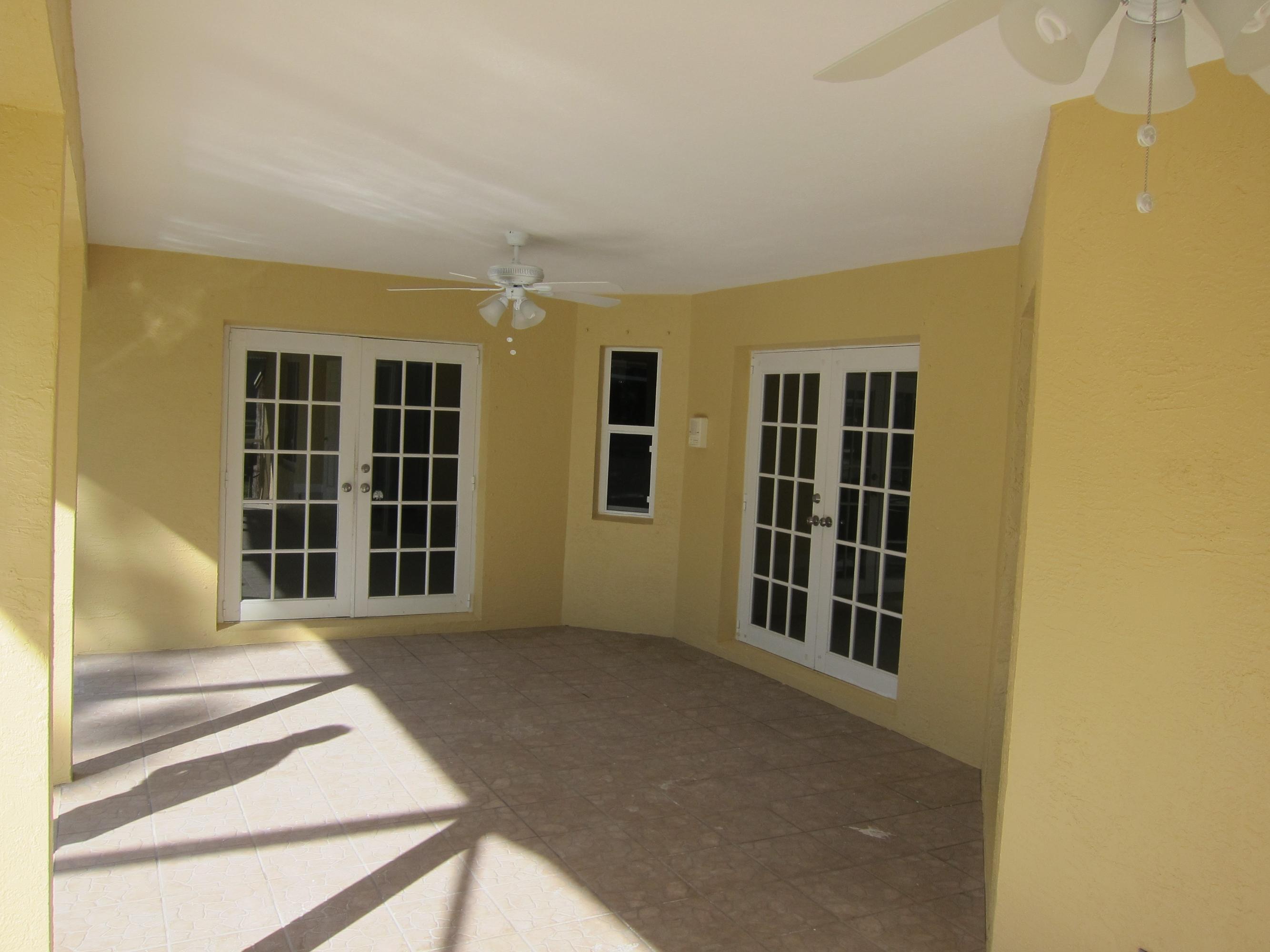 16228 63rd Road North Loxahatchee, FL 33470 - Photo 15 of 33 Patio roof area