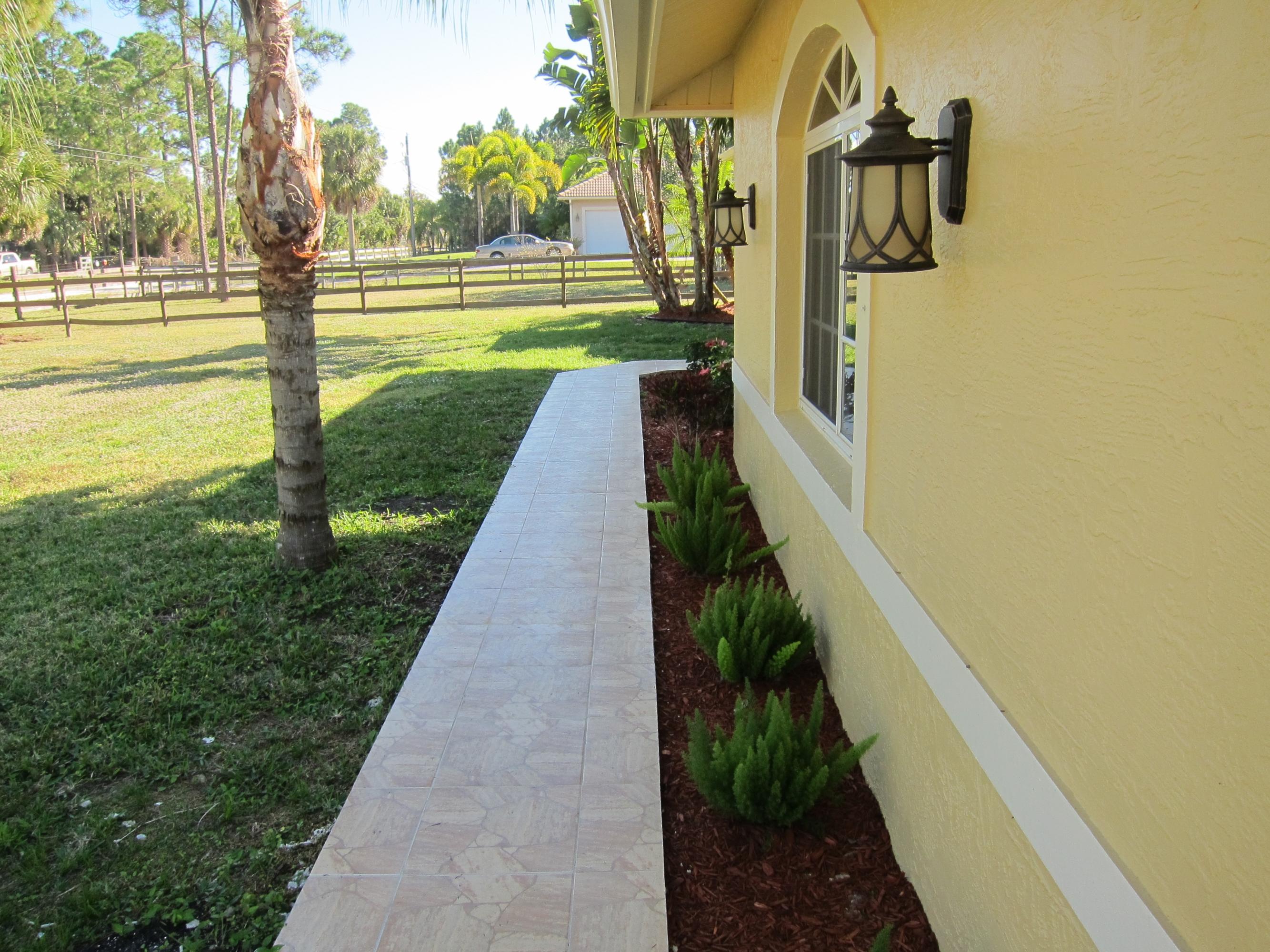 16228 63rd Road North Loxahatchee, FL 33470 - Photo 16 of 33 landscaping thru out