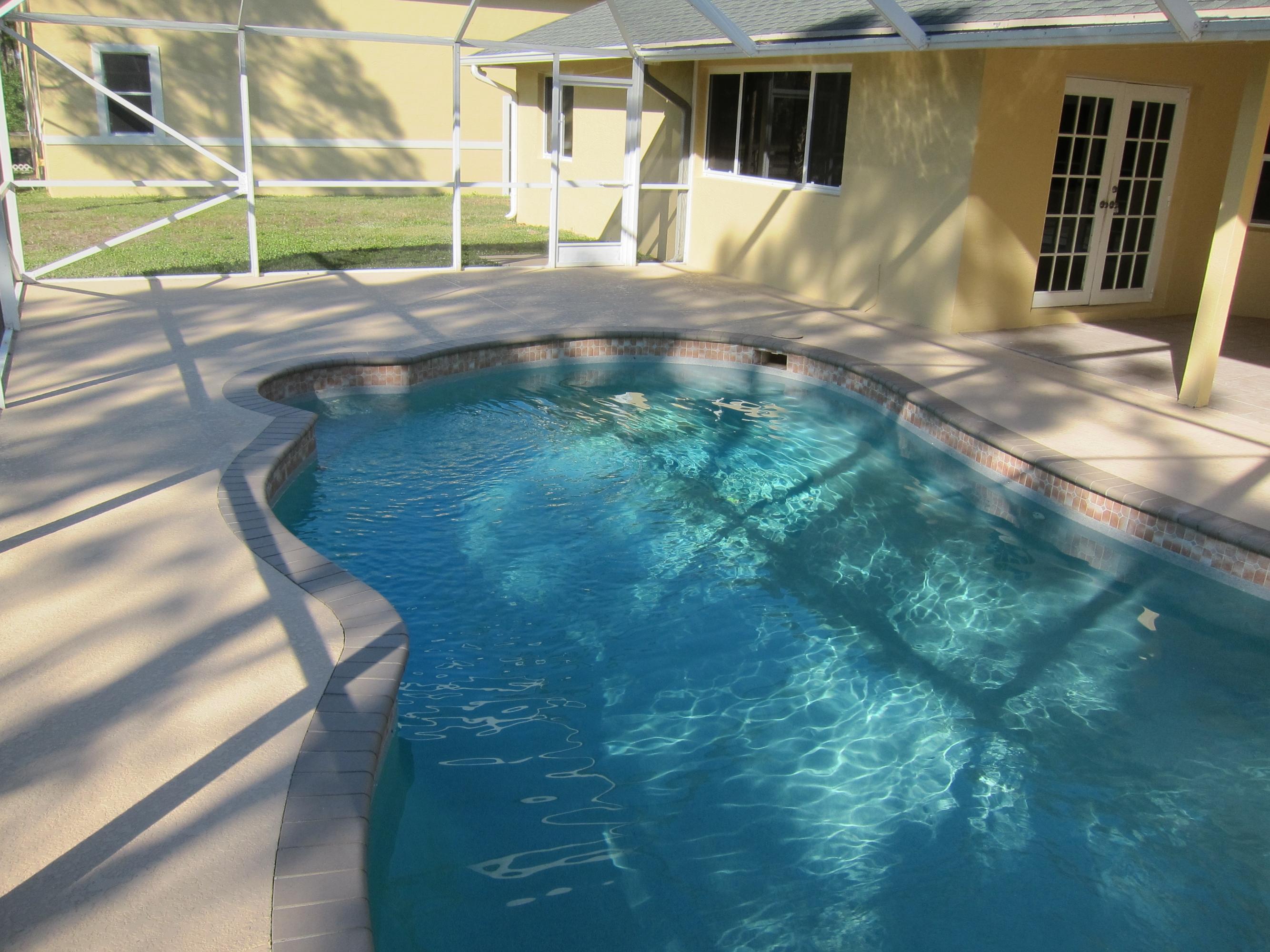 16228 63rd Road North Loxahatchee, FL 33470 - Photo 17 of 33 screen in pool area