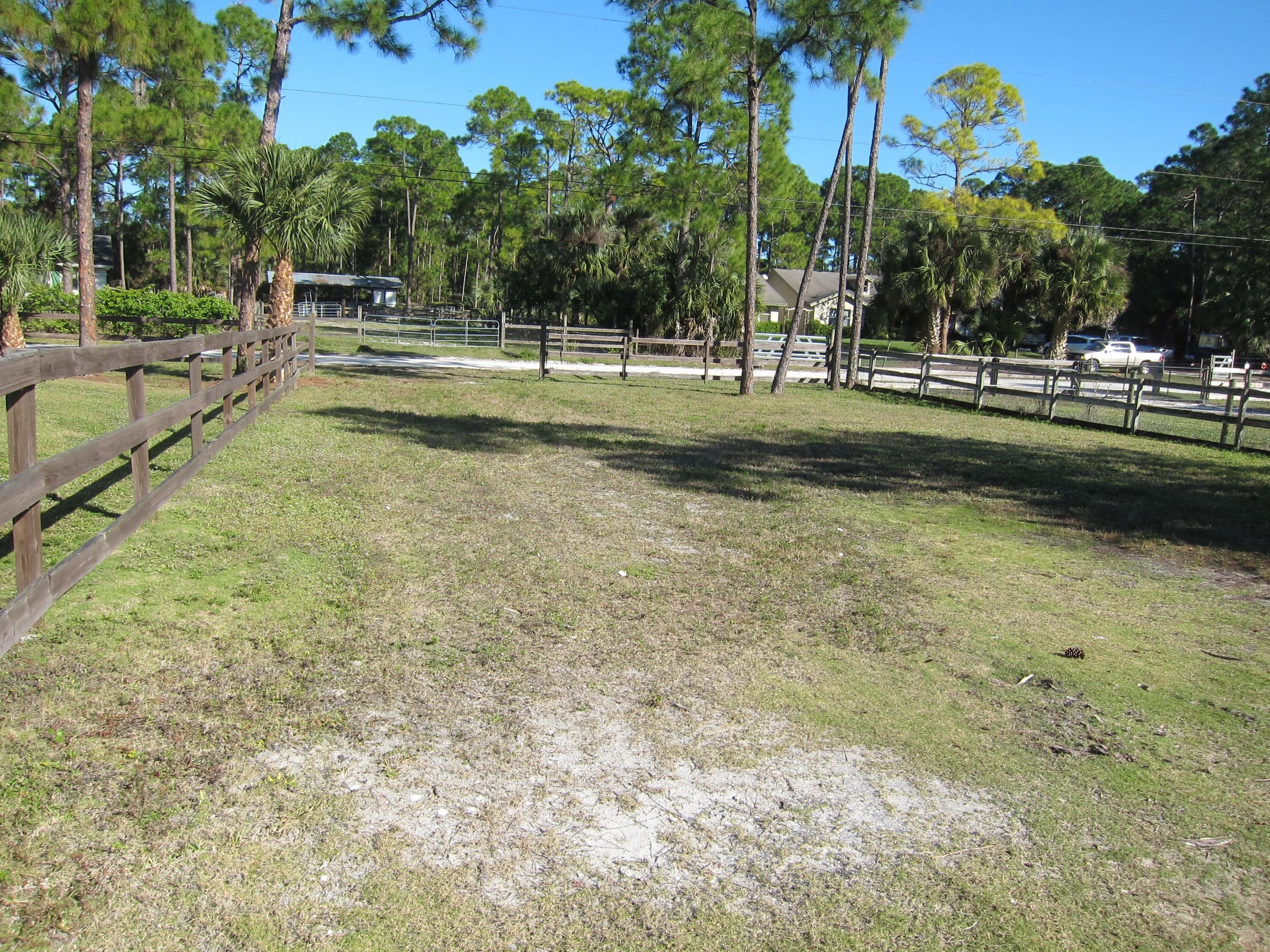 16228 63rd Road North Loxahatchee, FL 33470 - Photo 32 of 33 extra yard for horses and wood fence