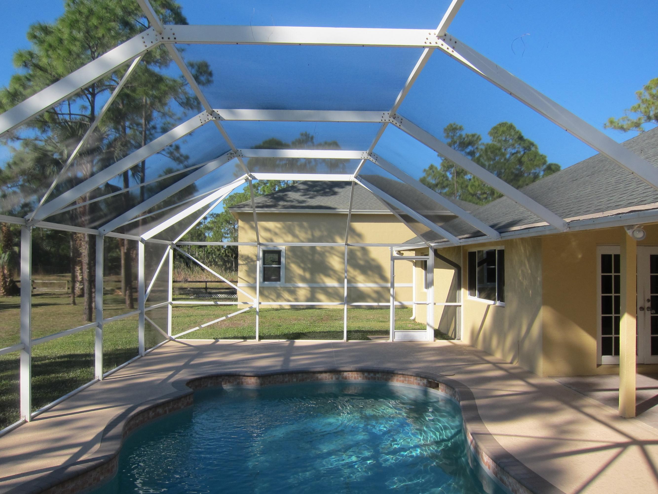 16228 63rd Road North Loxahatchee, FL 33470 - Photo 5 of 33 pool screen and covered