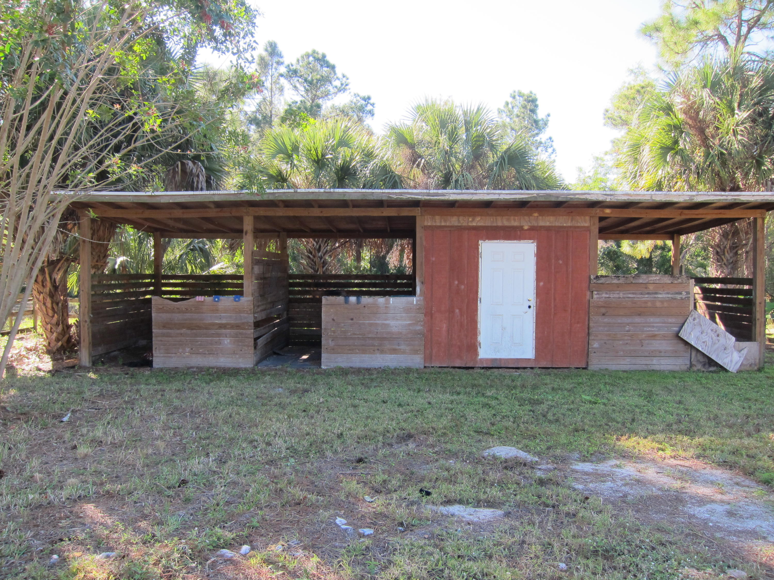 16228 63rd Road North Loxahatchee, FL 33470 - Photo 9 of 33 3 stall barn with tack room