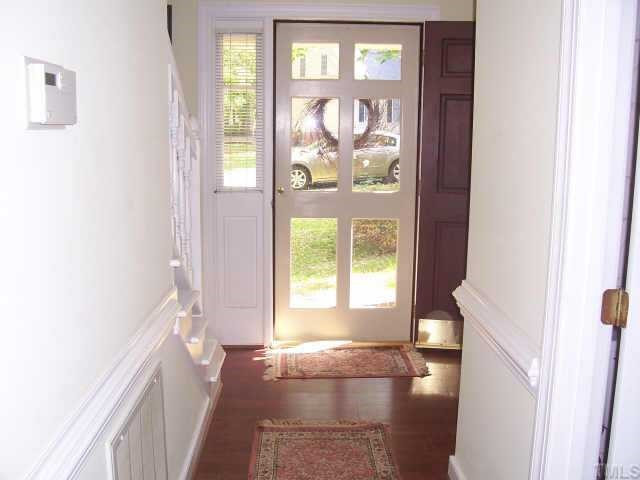 4509 Tetbury Place Raleigh, NC 27613 - Photo 3 of 12 Oh, Let the Sun Shine In . . . Bright and Sunny Foyer has Brazilian Cherry Laminate Flooring . . . How Inviting! Other