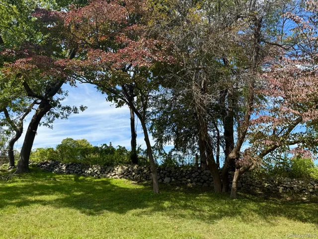 a view of a golf course with a yard