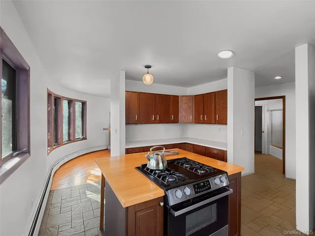 a view of a livingroom with furniture and a table