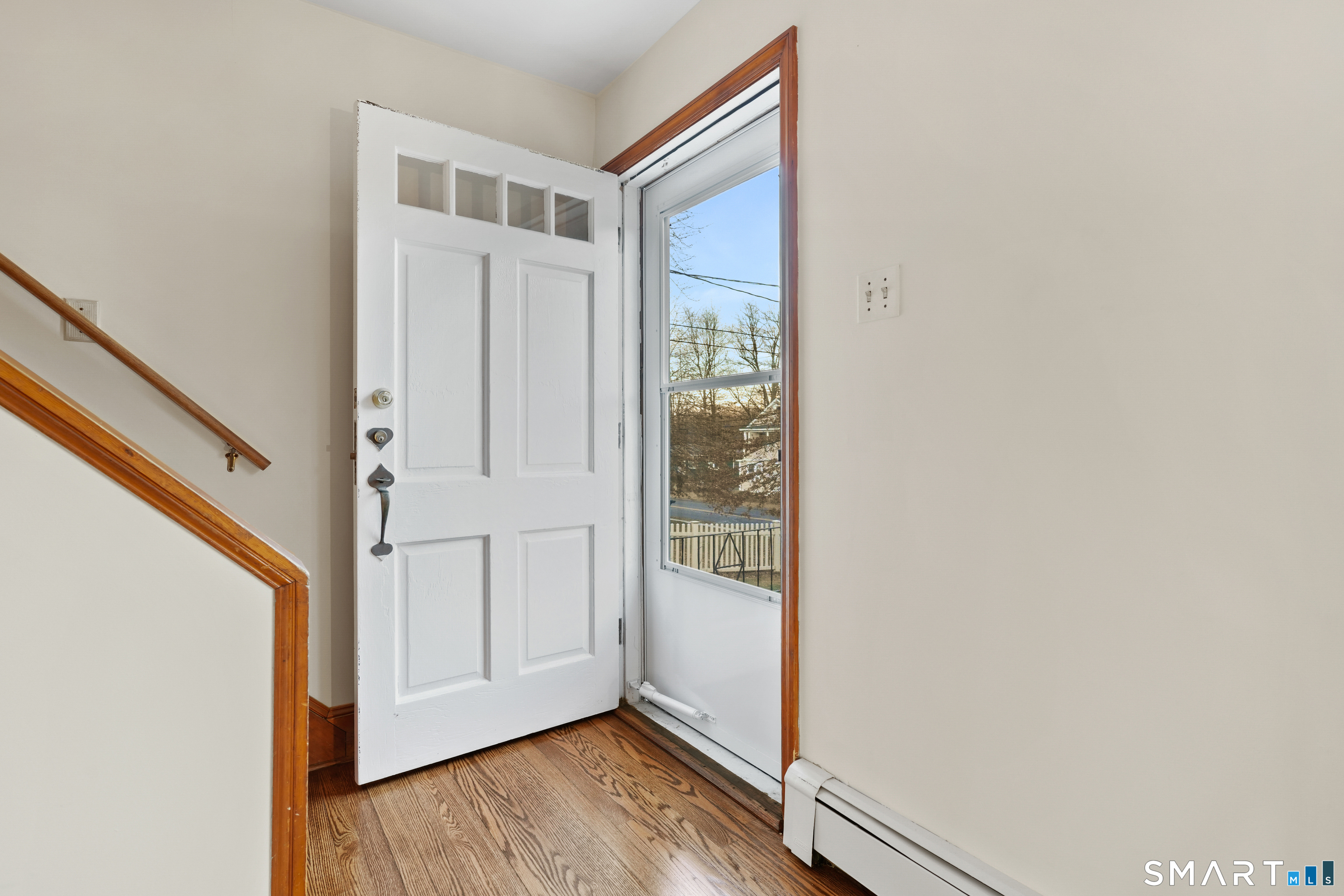 56 Beaver Brook Road Danbury, CT 06810 - Photo 36 of 38 a view of front door with wooden floor