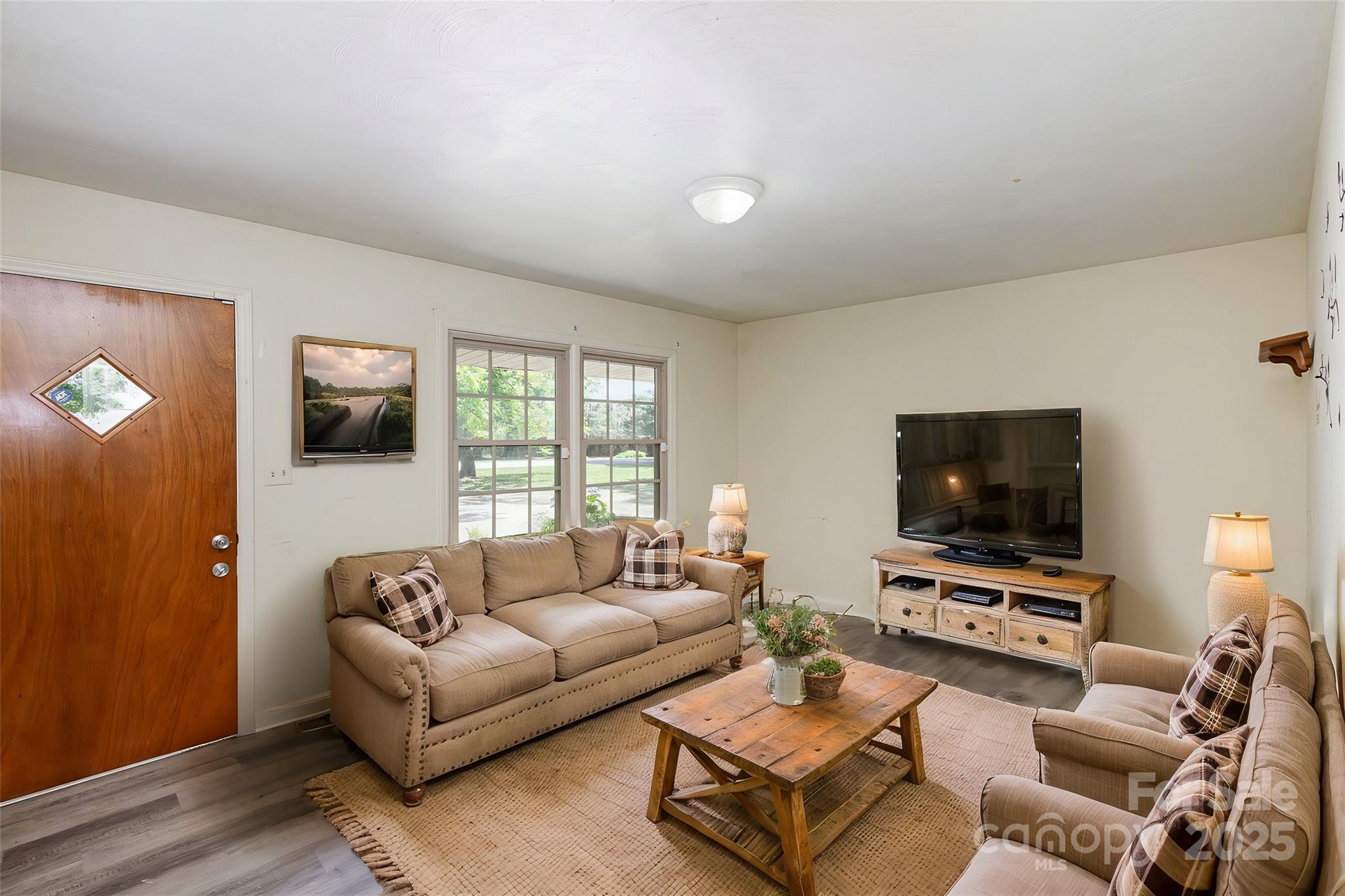 621 Oak Grove Road Kings Mountain, NC 28086 - Photo 8 of 34 a living room with furniture and a flat screen tv