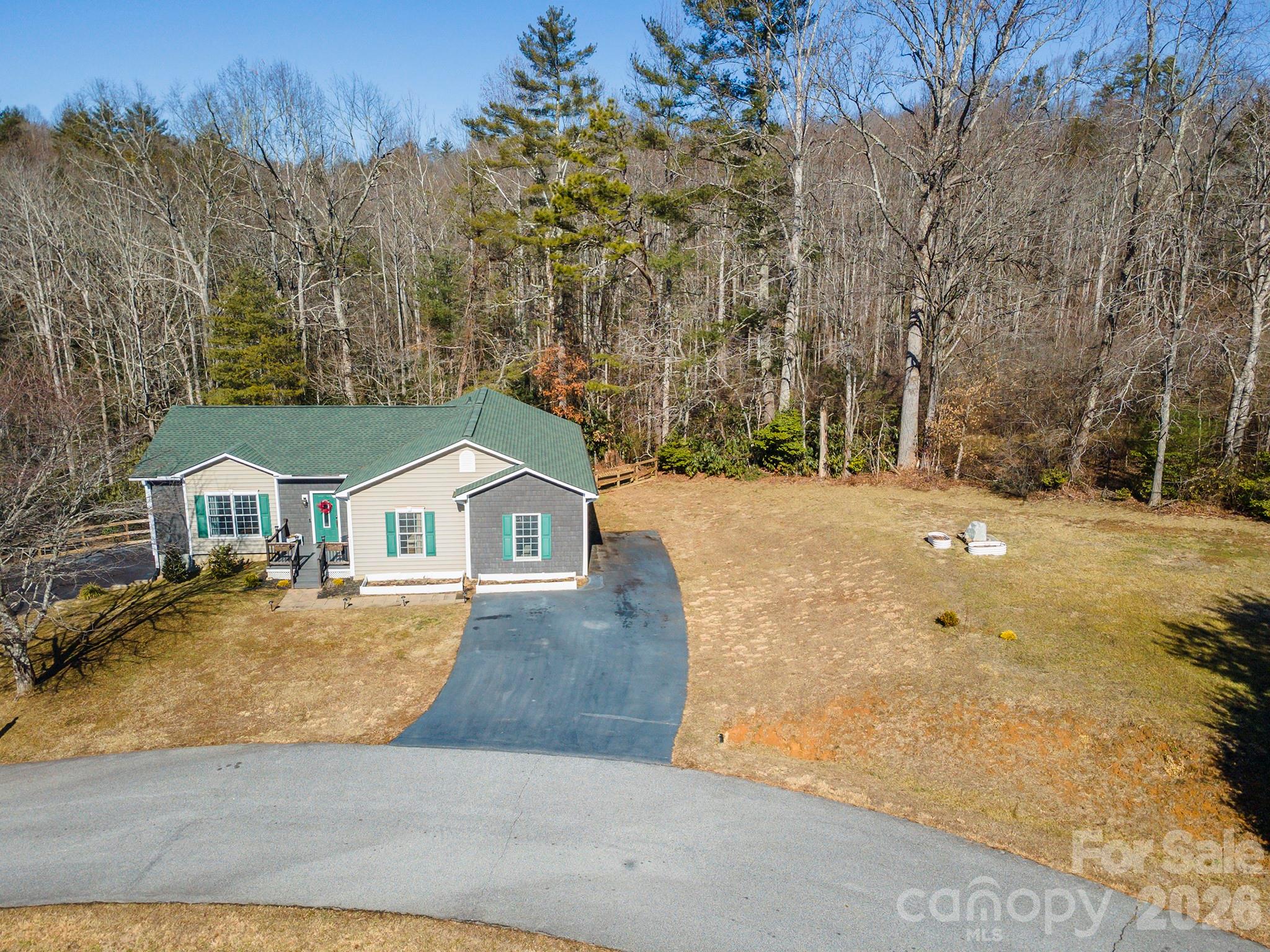 243 Scenic Ridge Drive Hendersonville, NC 28792 - Photo 3 of 47 a view of house with a yard