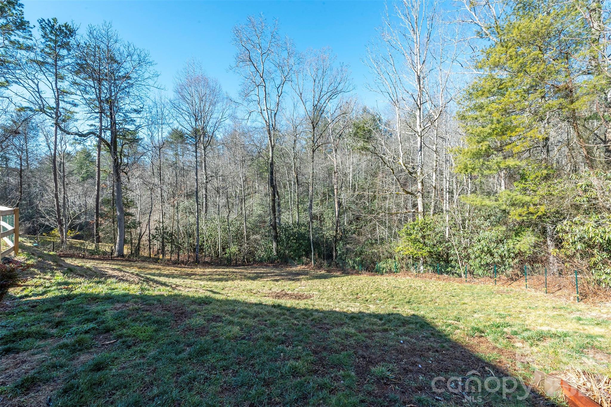 243 Scenic Ridge Drive Hendersonville, NC 28792 - Photo 37 of 47 a view of outdoor space with trees all around