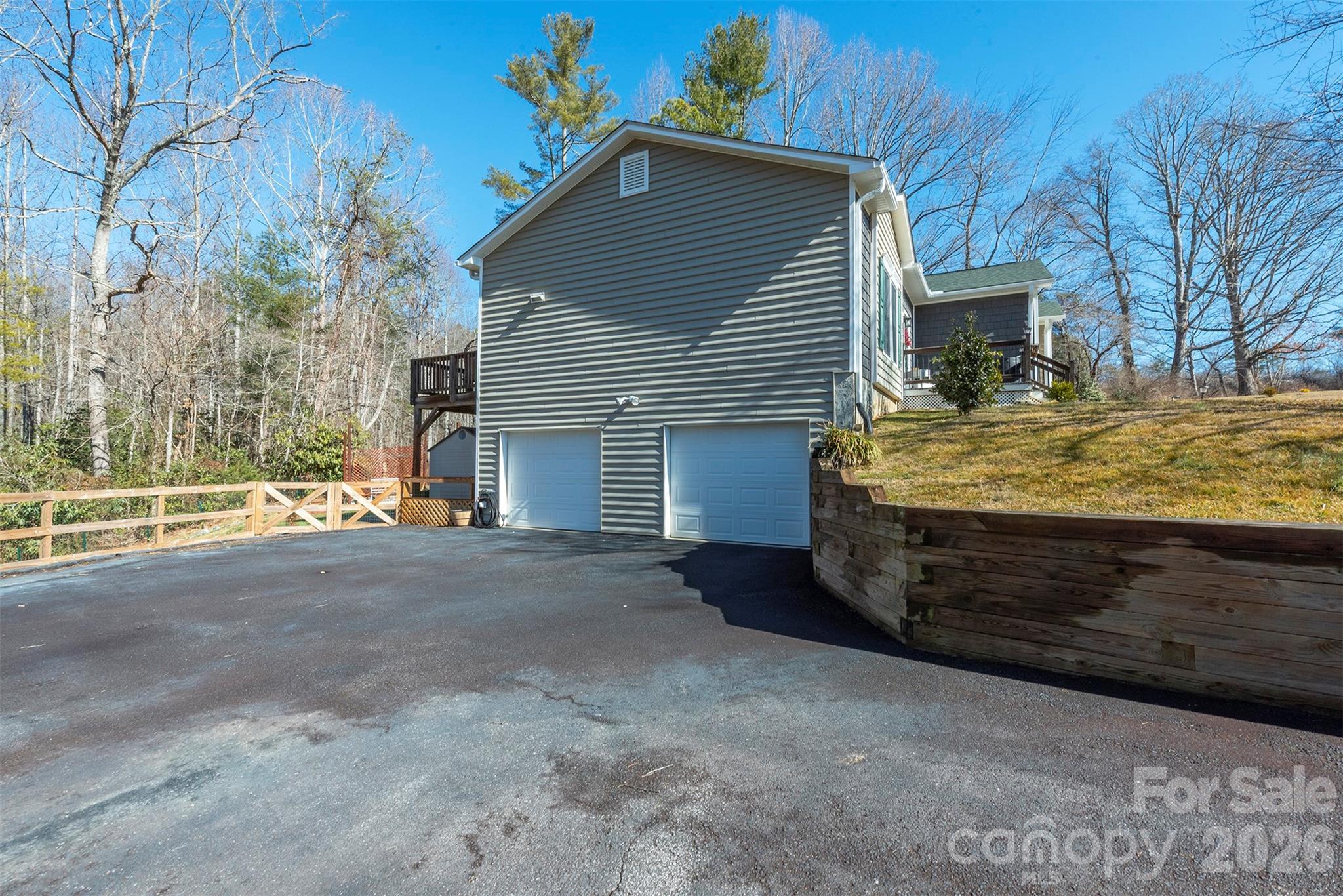 243 Scenic Ridge Drive Hendersonville, NC 28792 - Photo 46 of 47 a front view of a house with a yard