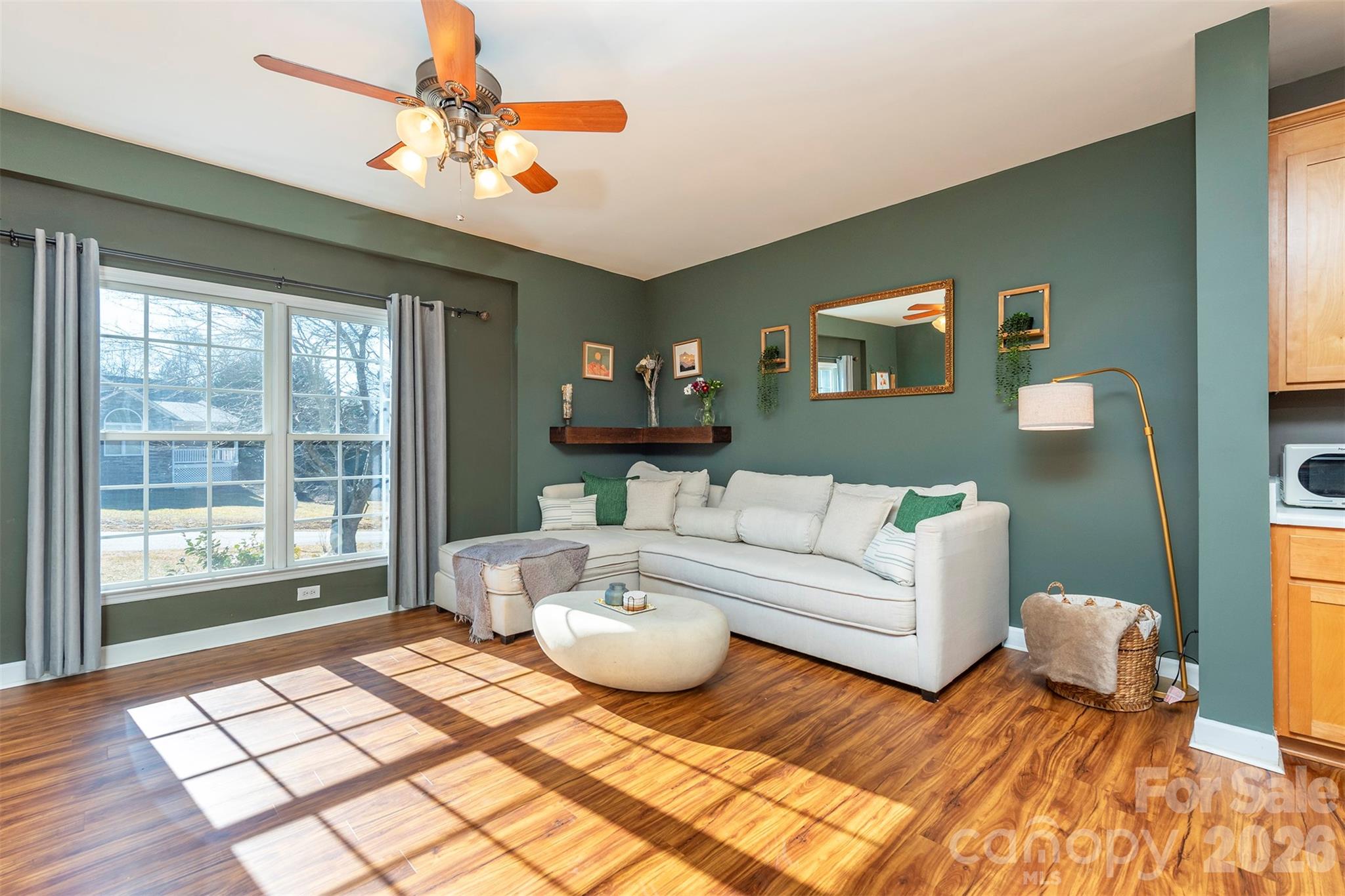 243 Scenic Ridge Drive Hendersonville, NC 28792 - Photo 8 of 47 a living room with furniture and a large window