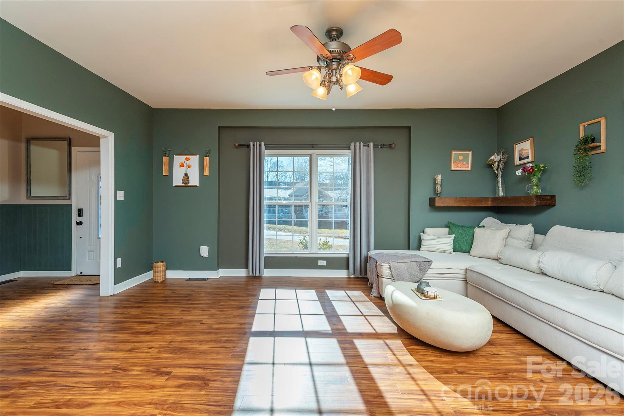 243 Scenic Ridge Drive Hendersonville, NC 28792 - Photo 9 of 47 a living room with furniture and a large window