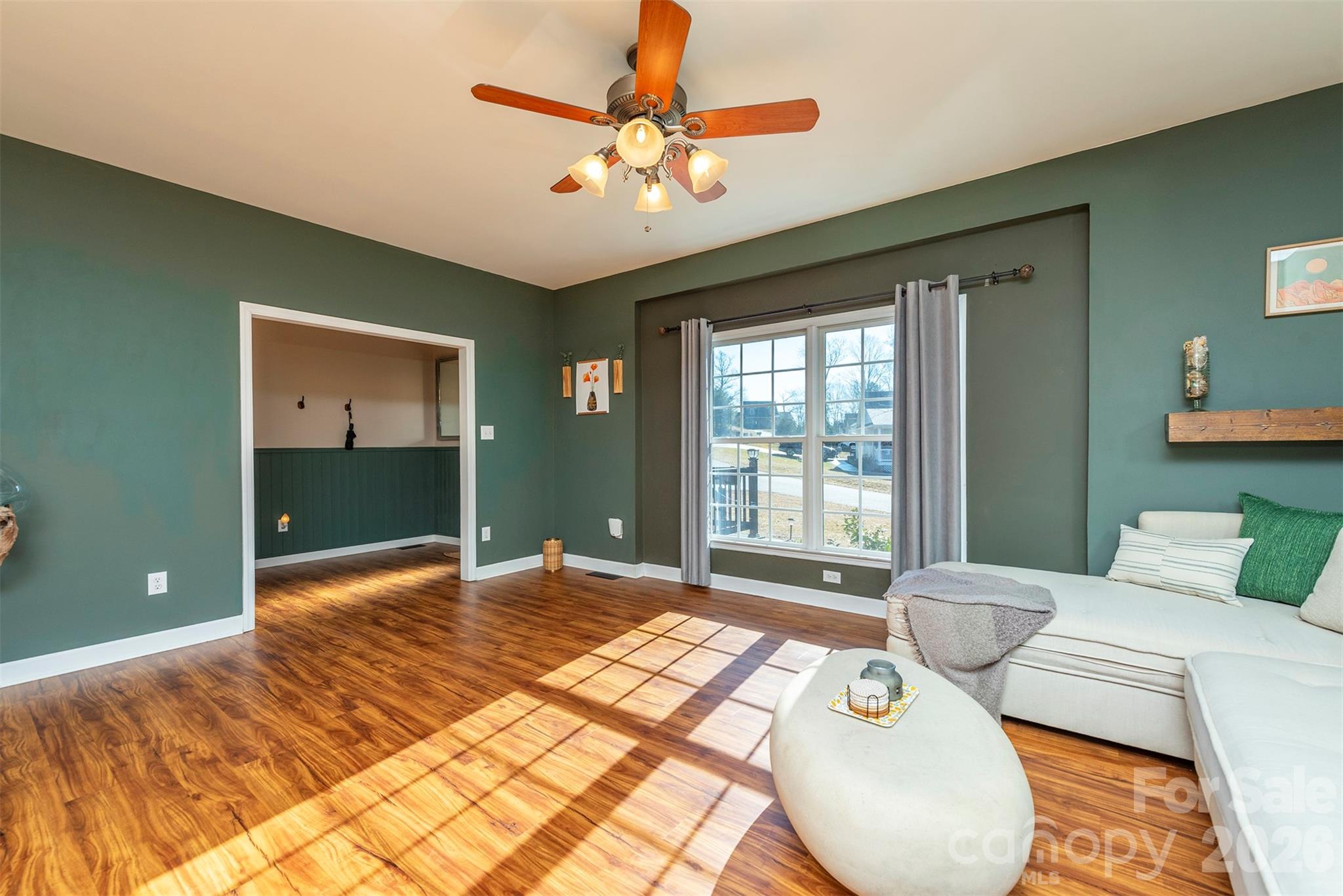 243 Scenic Ridge Drive Hendersonville, NC 28792 - Photo 10 of 47 a bedroom with a bed and a large window