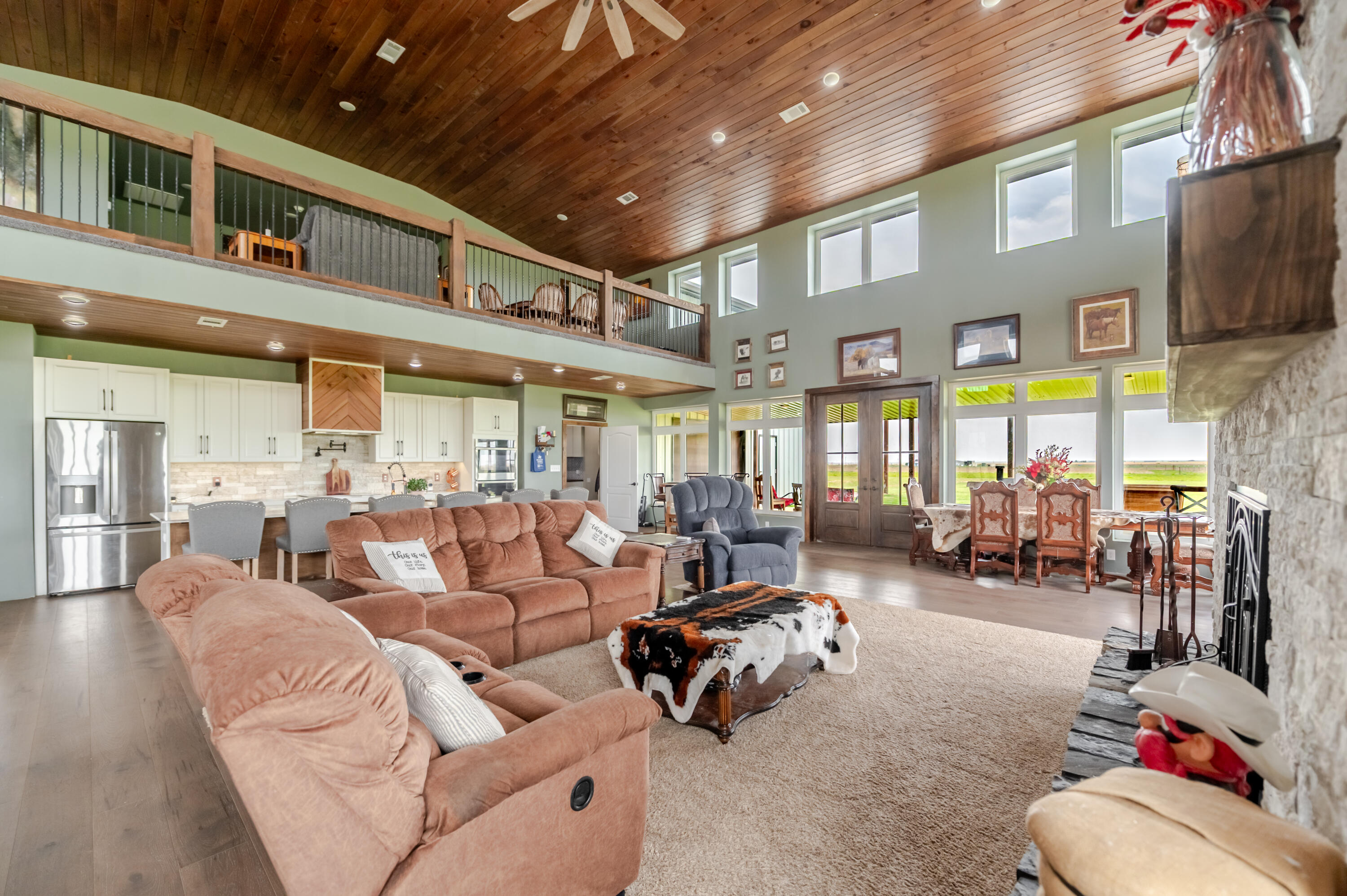 6792 Maine Road Anton, TX 79313 - Photo 38 of 77 a living room with fireplace furniture and a large window