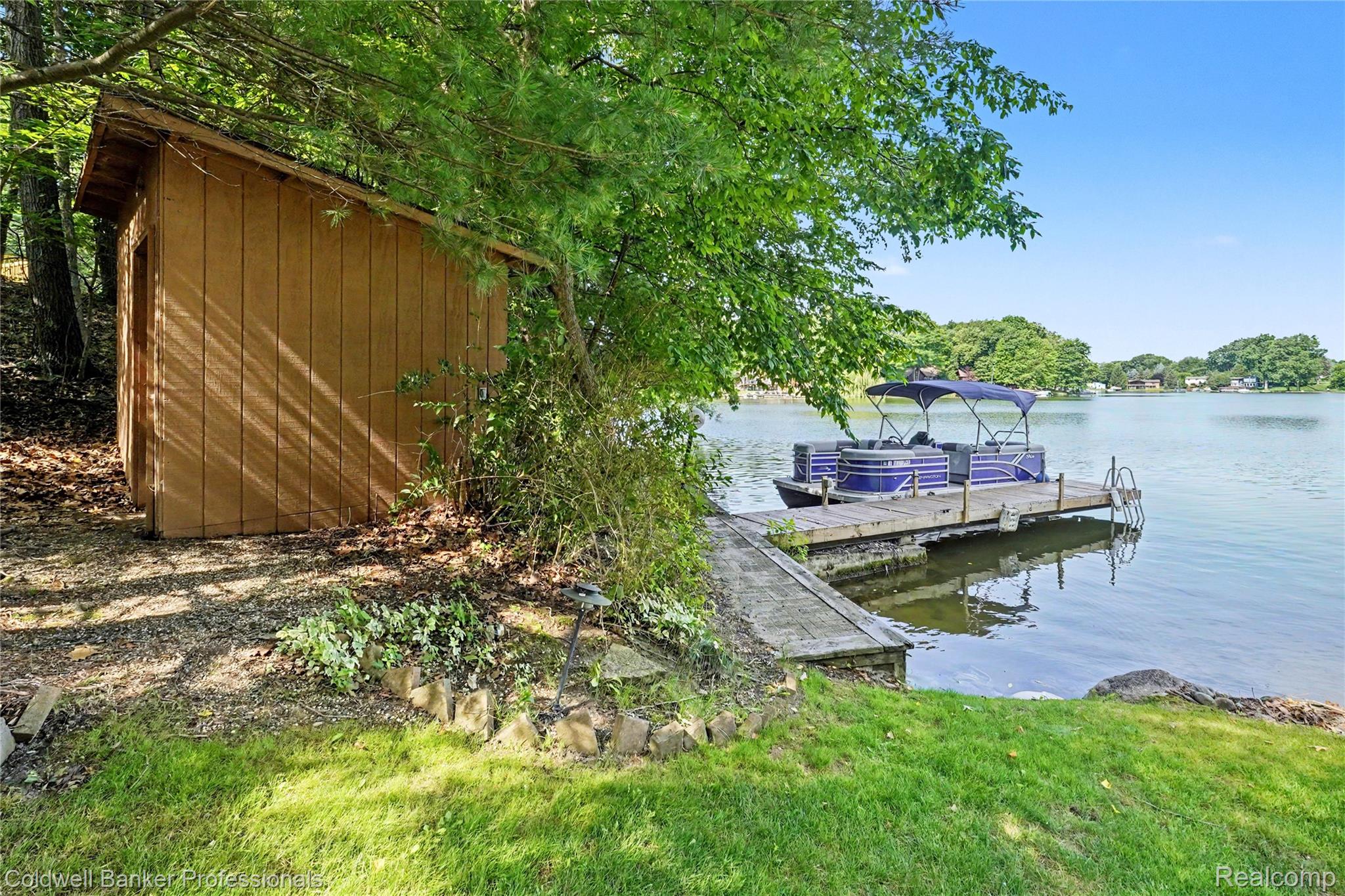 3583 Mitchell Road Metamora, MI 48455 - Photo 11 of 58 Private dock with a boat lift, offering direct water access