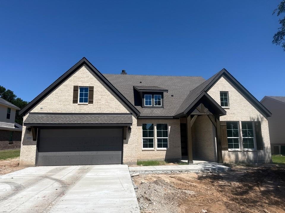 404 Guadalupe Lane Springtown, TX 76082 - Photo 1 of 9 a front view of a house with a yard