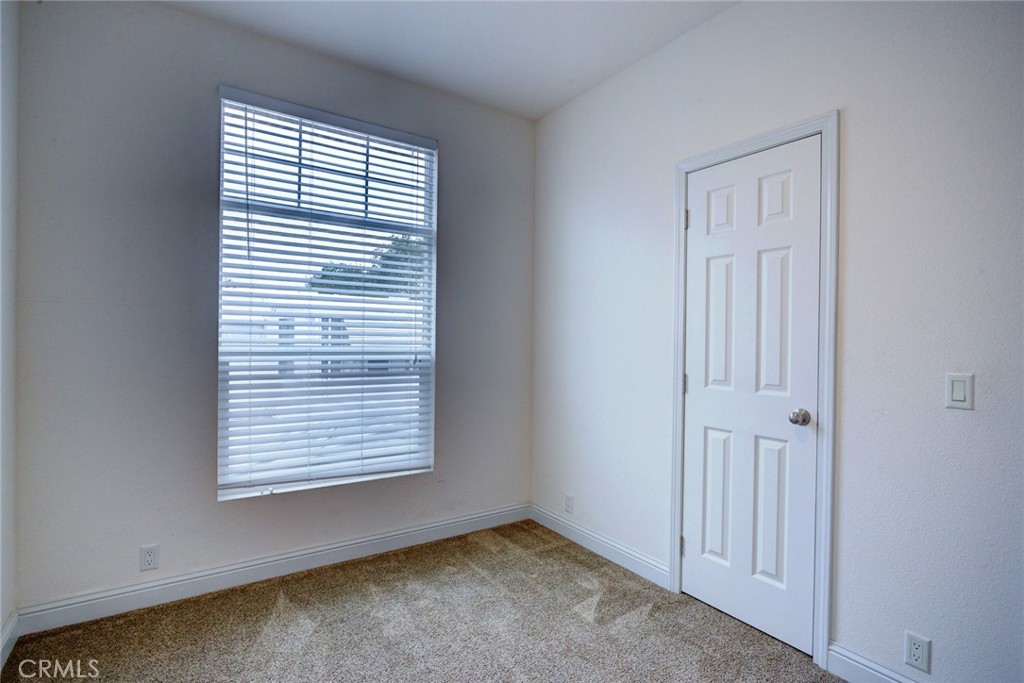 1701 Los Osos Valley Road, Unit 19 Los Osos, CA 93402 - Photo 16 of 31 an empty room with a window