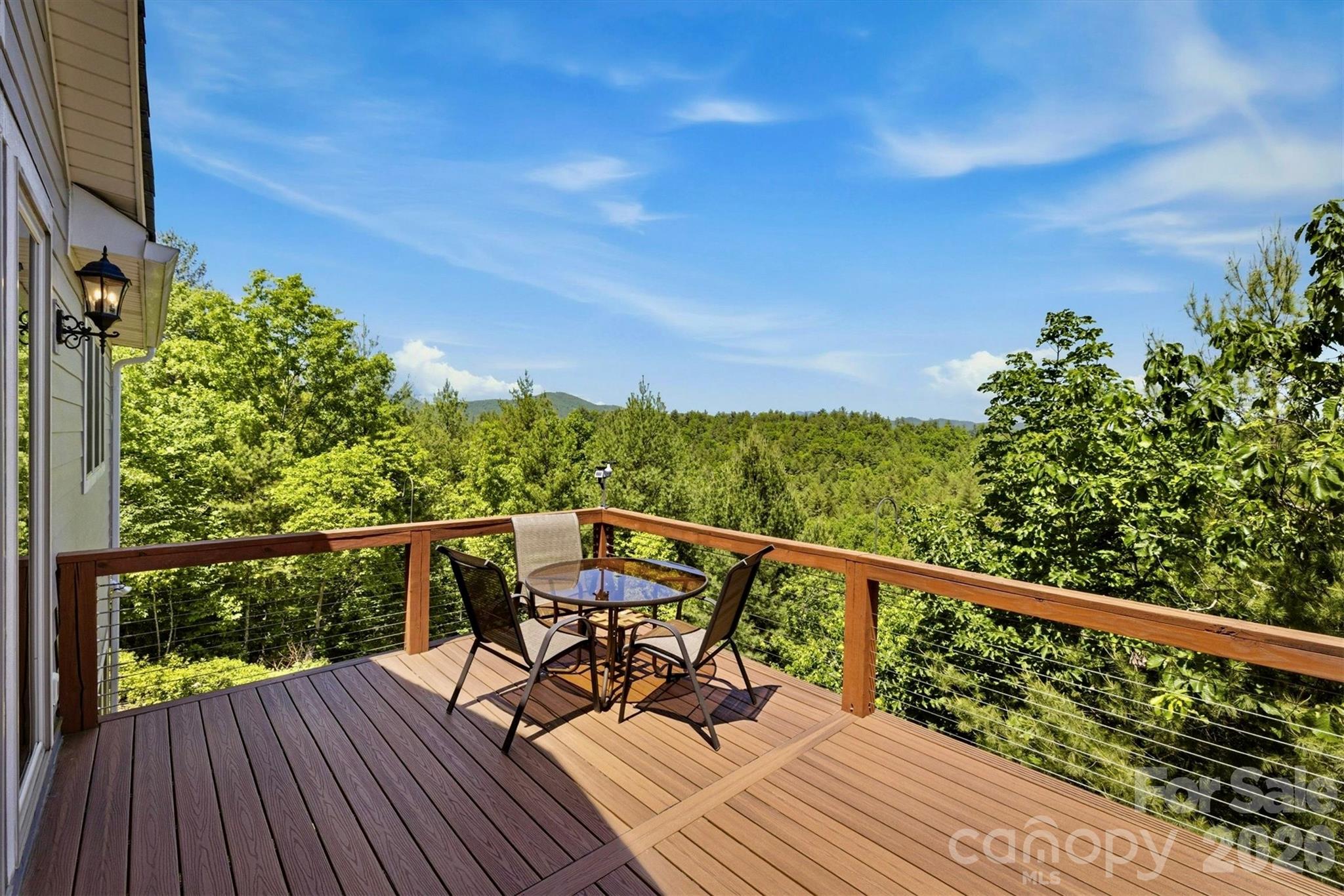 5564 Table View Lane Lenoir, NC 28645 - Photo 11 of 48 a view of a balcony with wooden floor and outdoor space