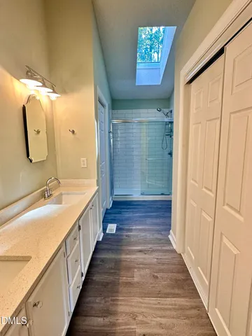 a view of a park with houses