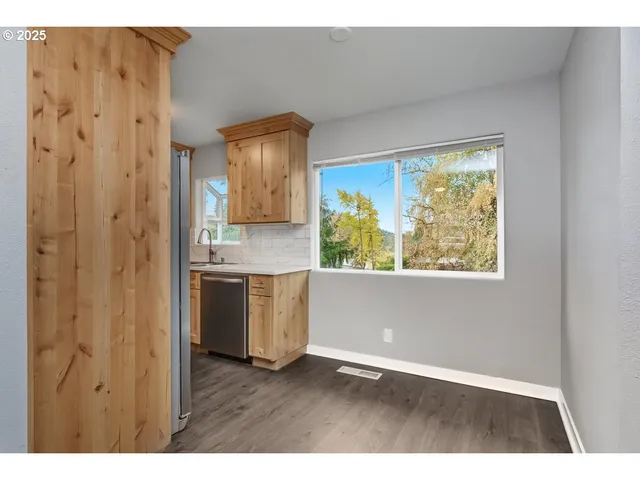 a bathroom with a sink and a large mirror