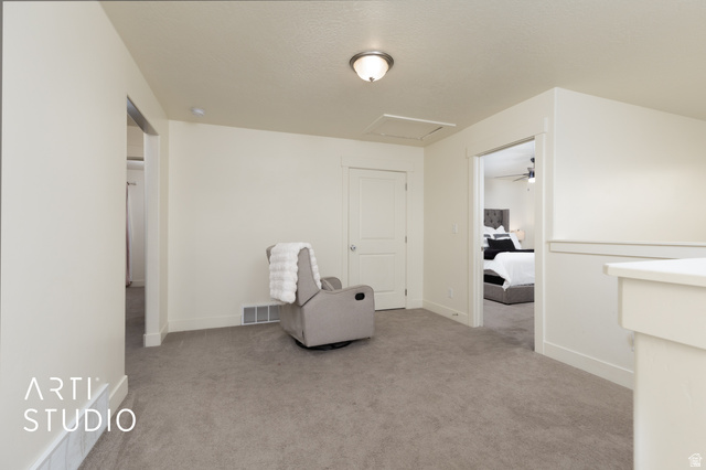 1713 South Windemere Road Santaquin, UT 84655 - Photo 20 of 40 Neutral-toned carpeting and walls create a cohesive aesthetic in this interior space
