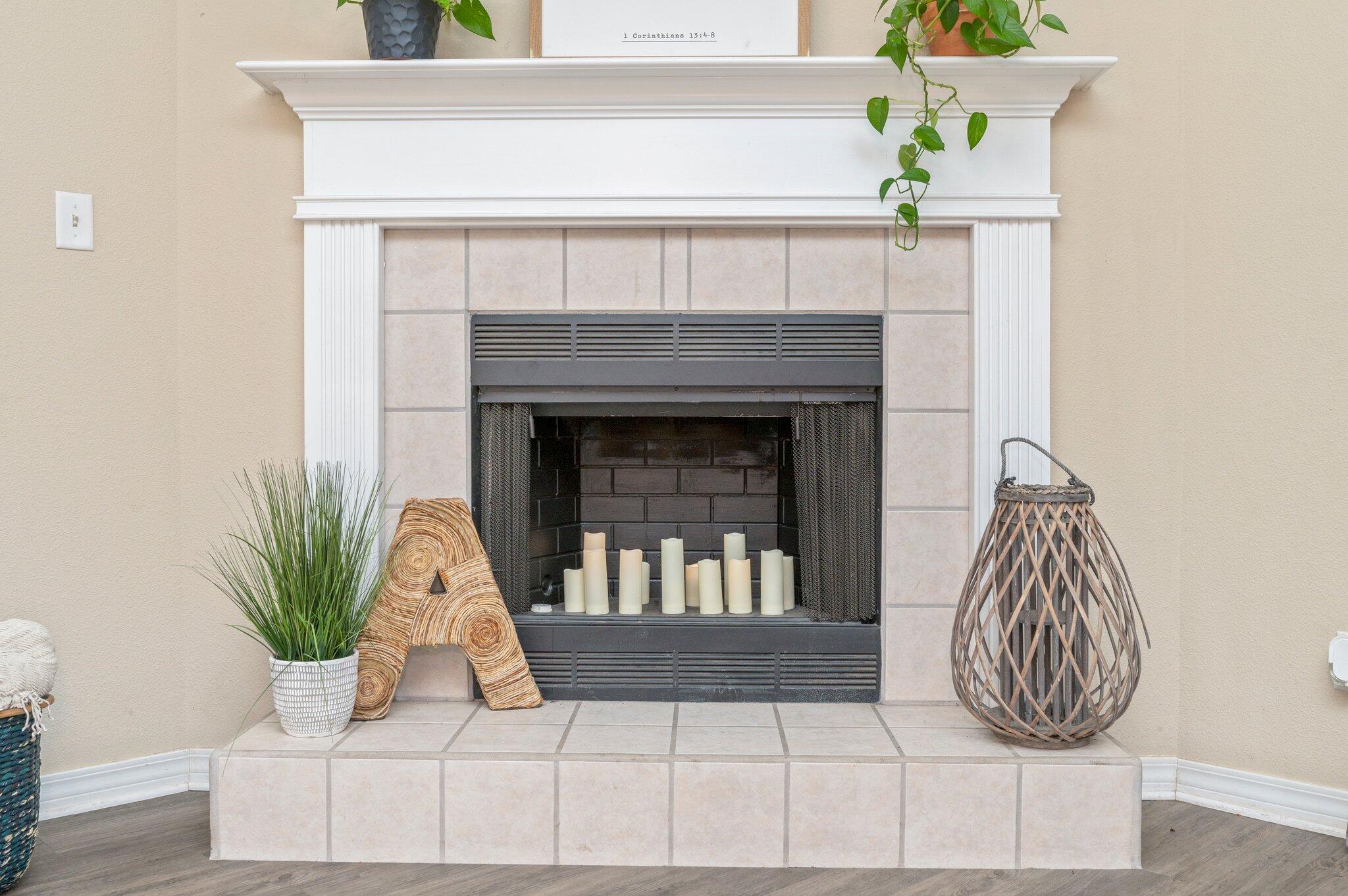 5938 Ridgeview Drive Milton, FL 32570 - Photo 15 of 58 a living room with furniture and a fireplace