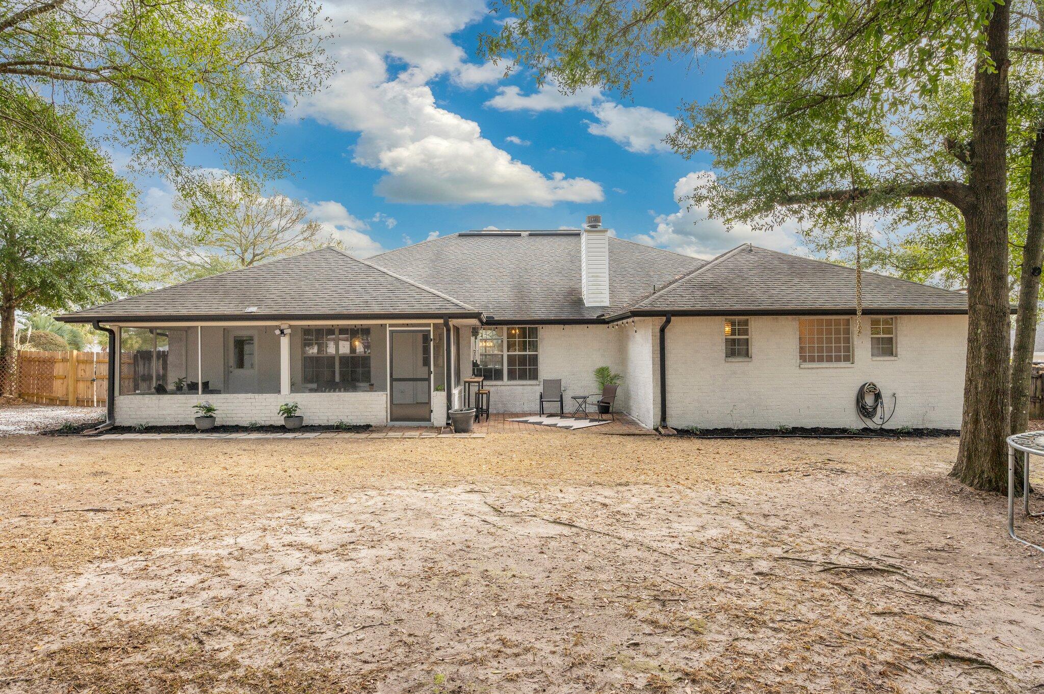 5938 Ridgeview Drive Milton, FL 32570 - Photo 49 of 58 a house with a yard