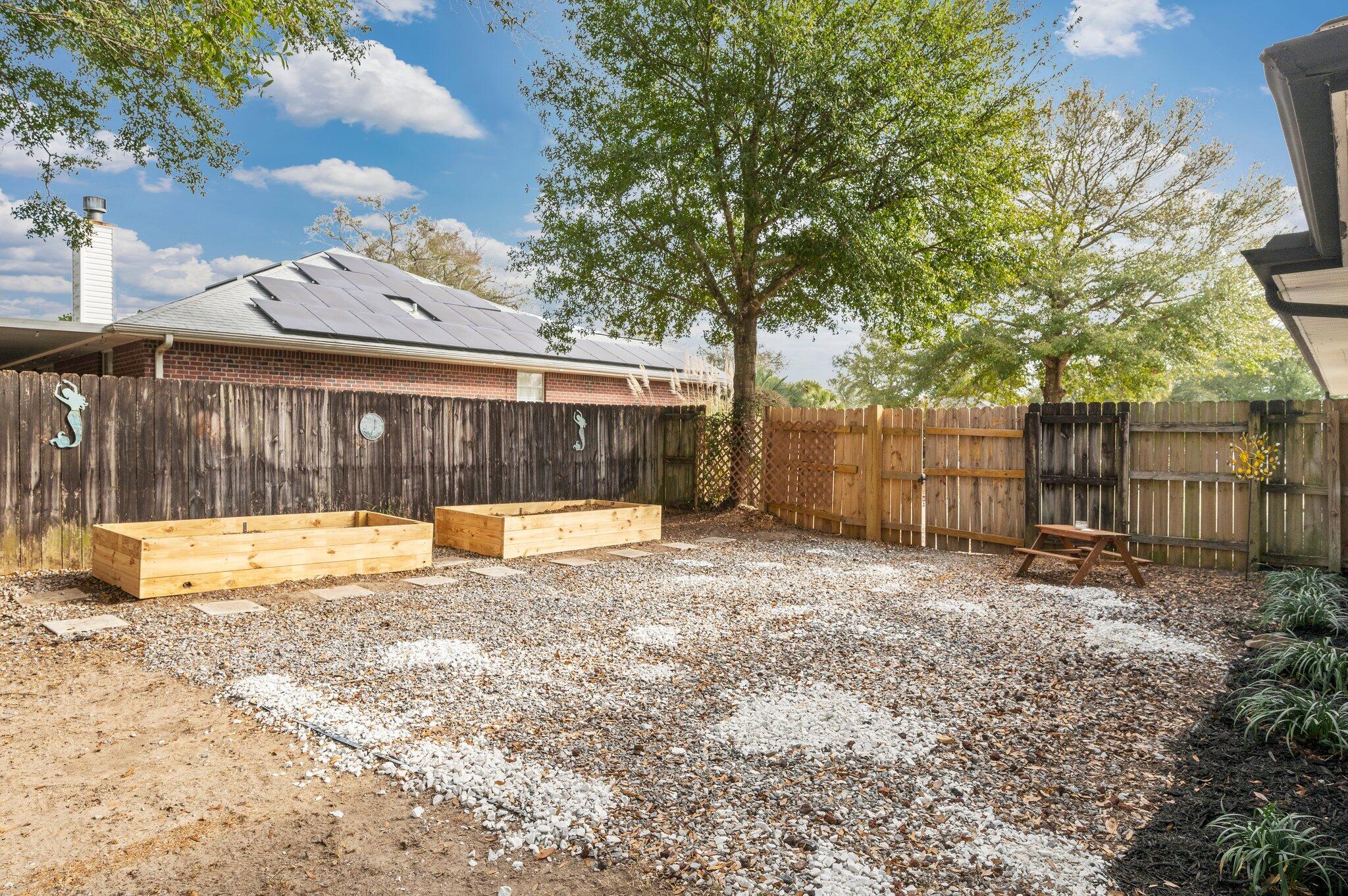 5938 Ridgeview Drive Milton, FL 32570 - Photo 50 of 58 a view of a house with a yard