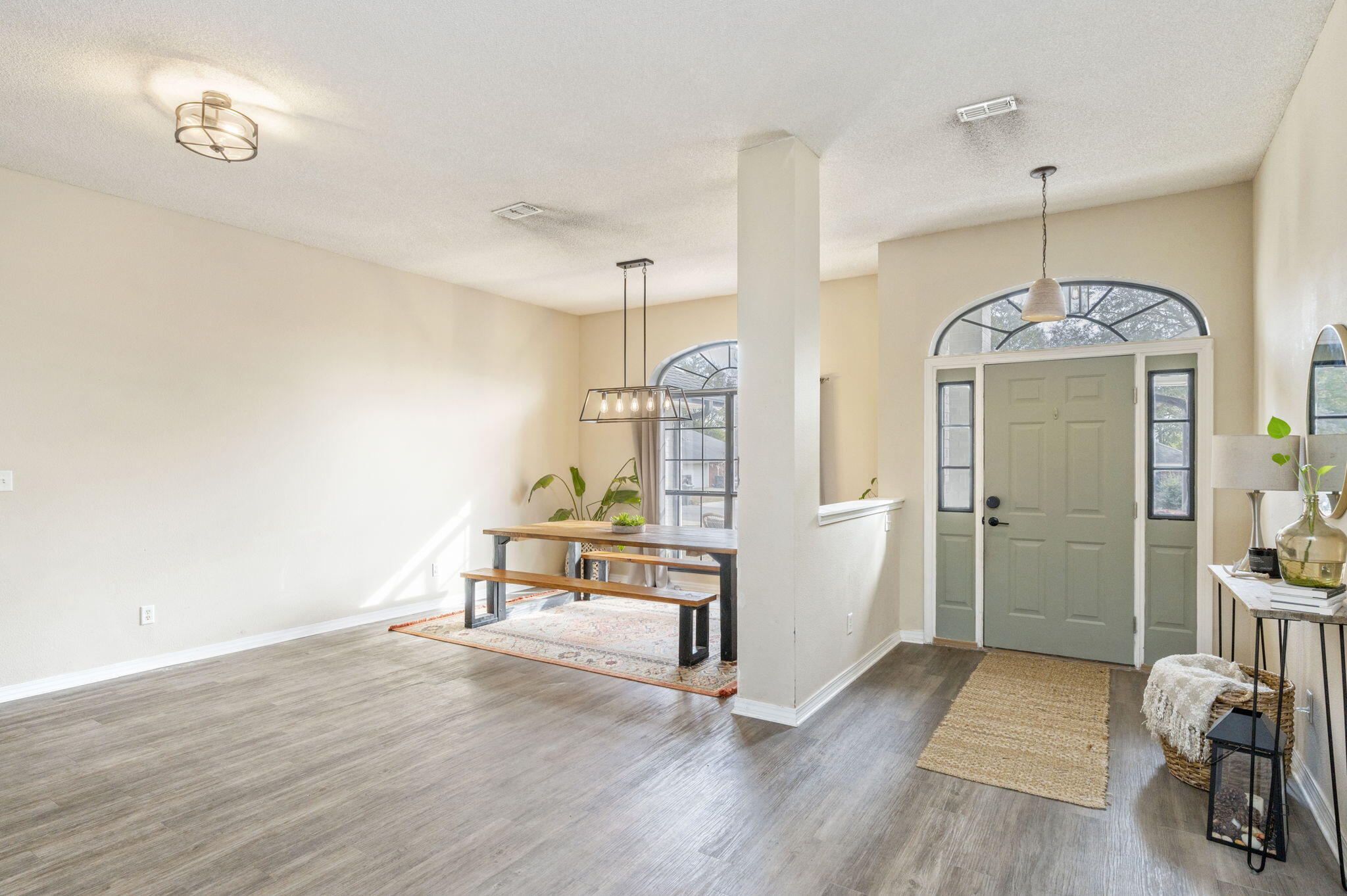 5938 Ridgeview Drive Milton, FL 32570 - Photo 7 of 58 a view of a room with wooden floor and furniture