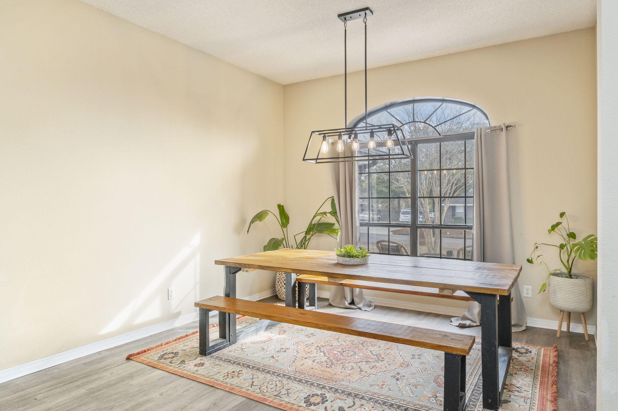 5938 Ridgeview Drive Milton, FL 32570 - Photo 10 of 58 a view of a living room and a chandelier fan