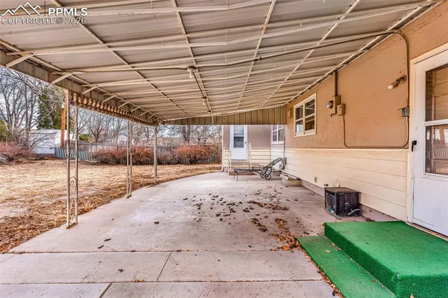 a view of a backyard of the house