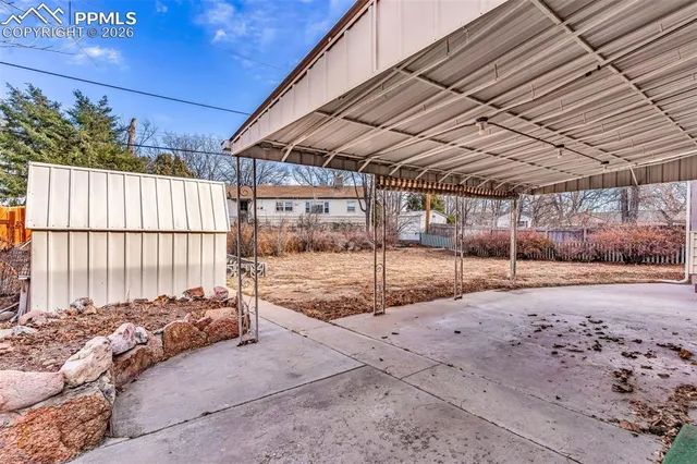 a view of a backyard of a house
