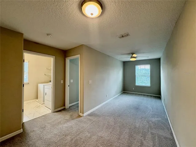 a view of a livingroom with a window